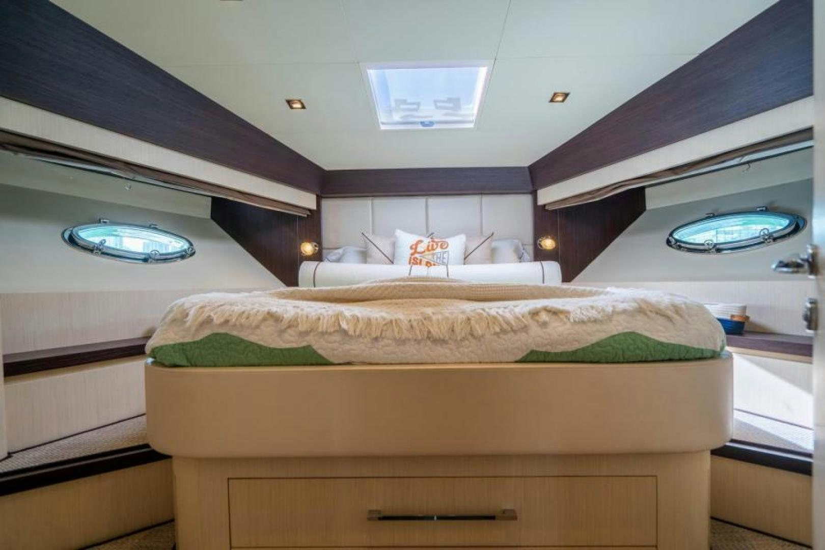 a bed in a room aboard EQUINOX Yacht for Sale