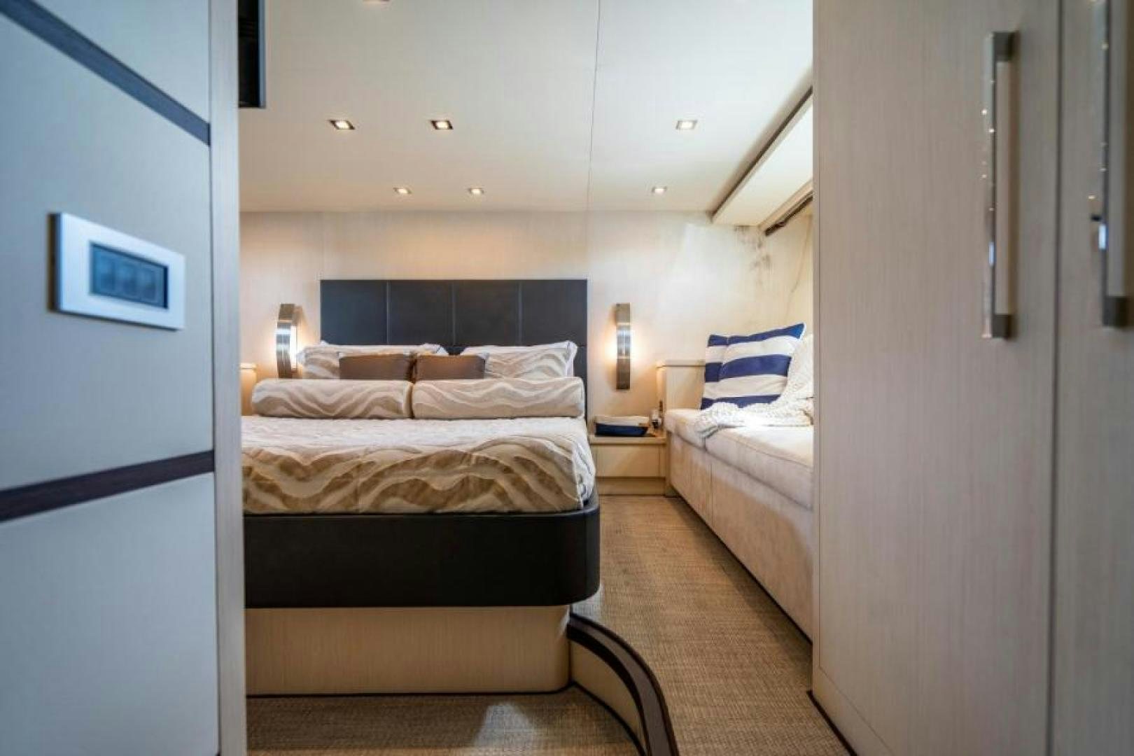 a room with two beds aboard EQUINOX Yacht for Sale