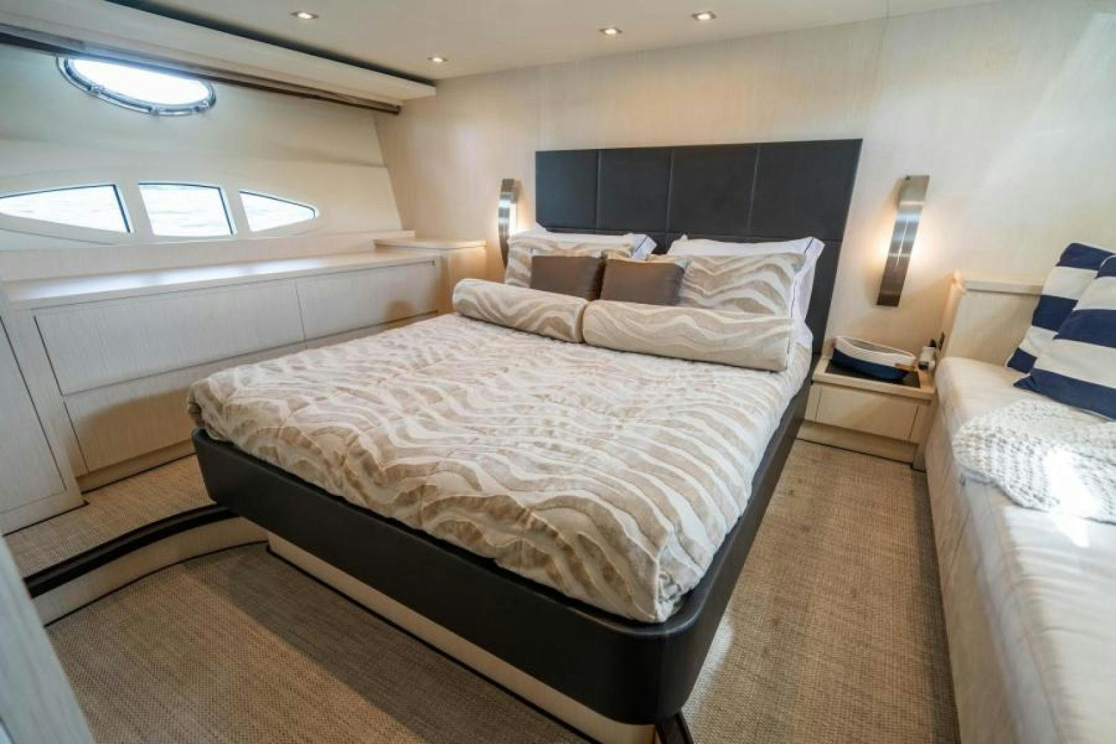 a room with two beds aboard EQUINOX Yacht for Sale