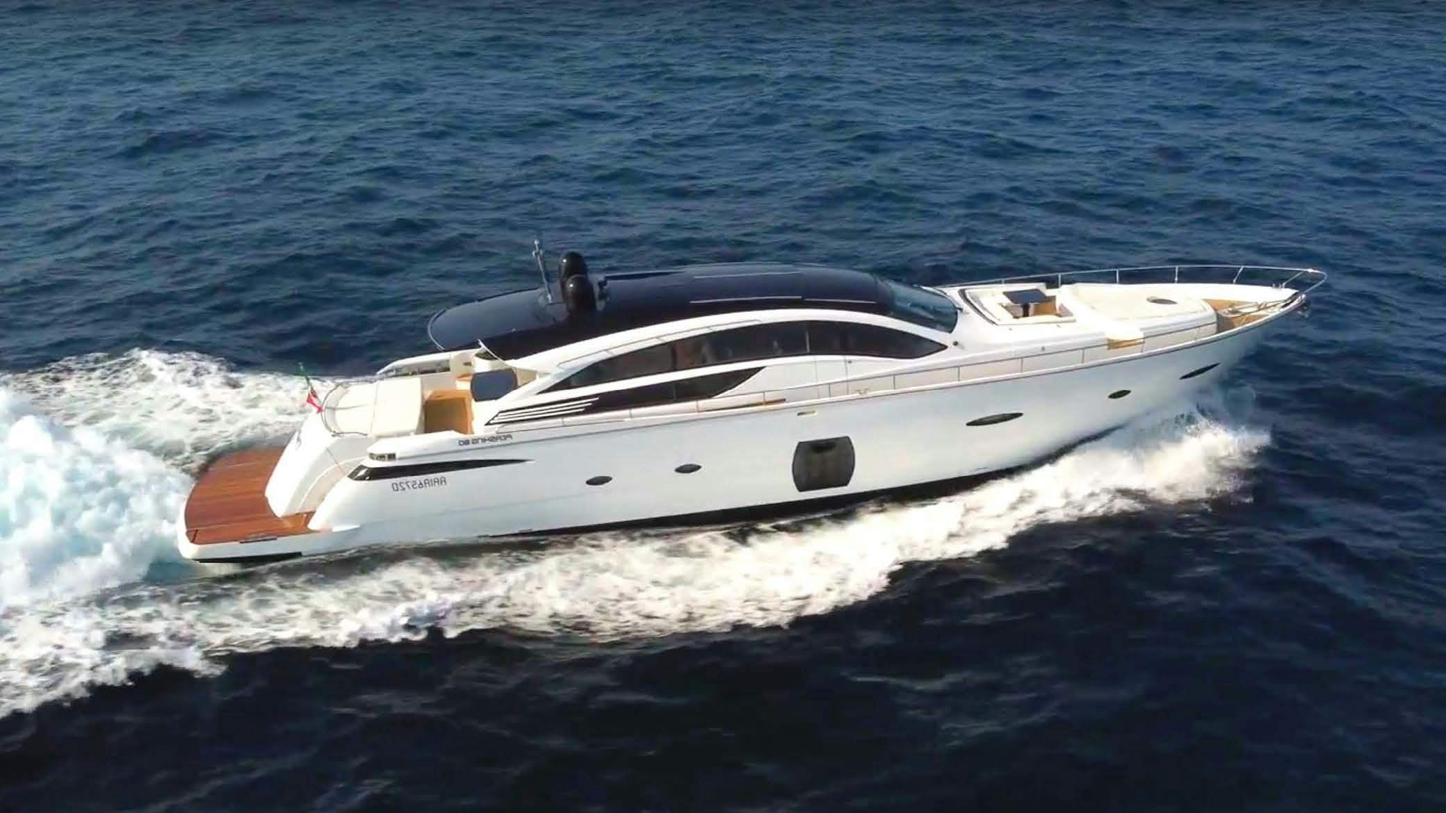 a white yacht on the water aboard THYKE II Yacht for Charter