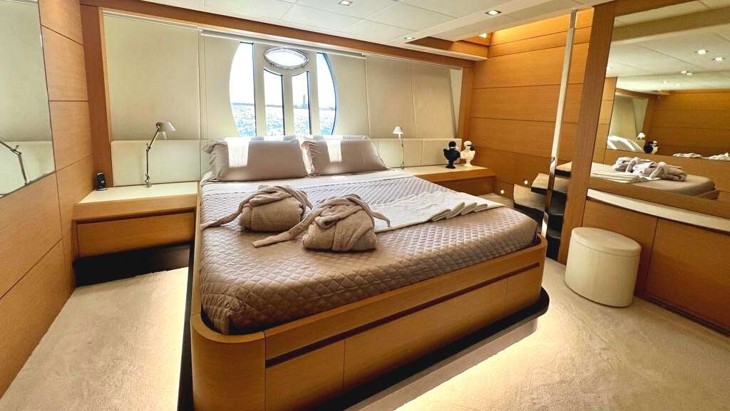 a bed in a room aboard THYKE II Yacht for Charter
