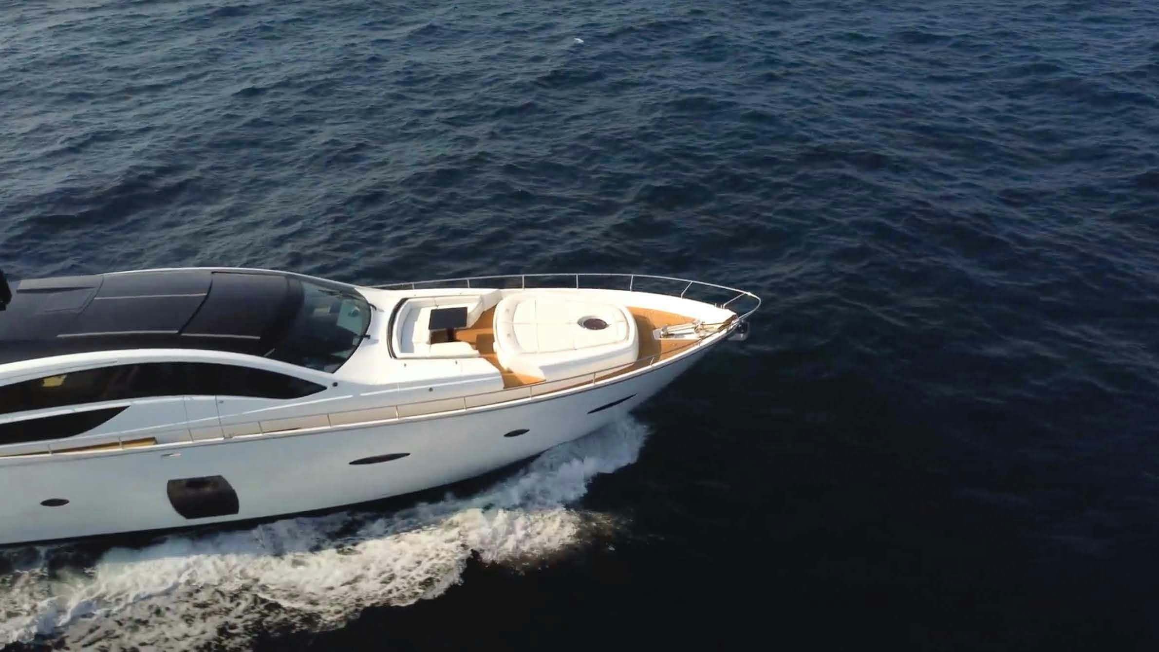 a white boat in the water aboard THYKE II Yacht for Charter