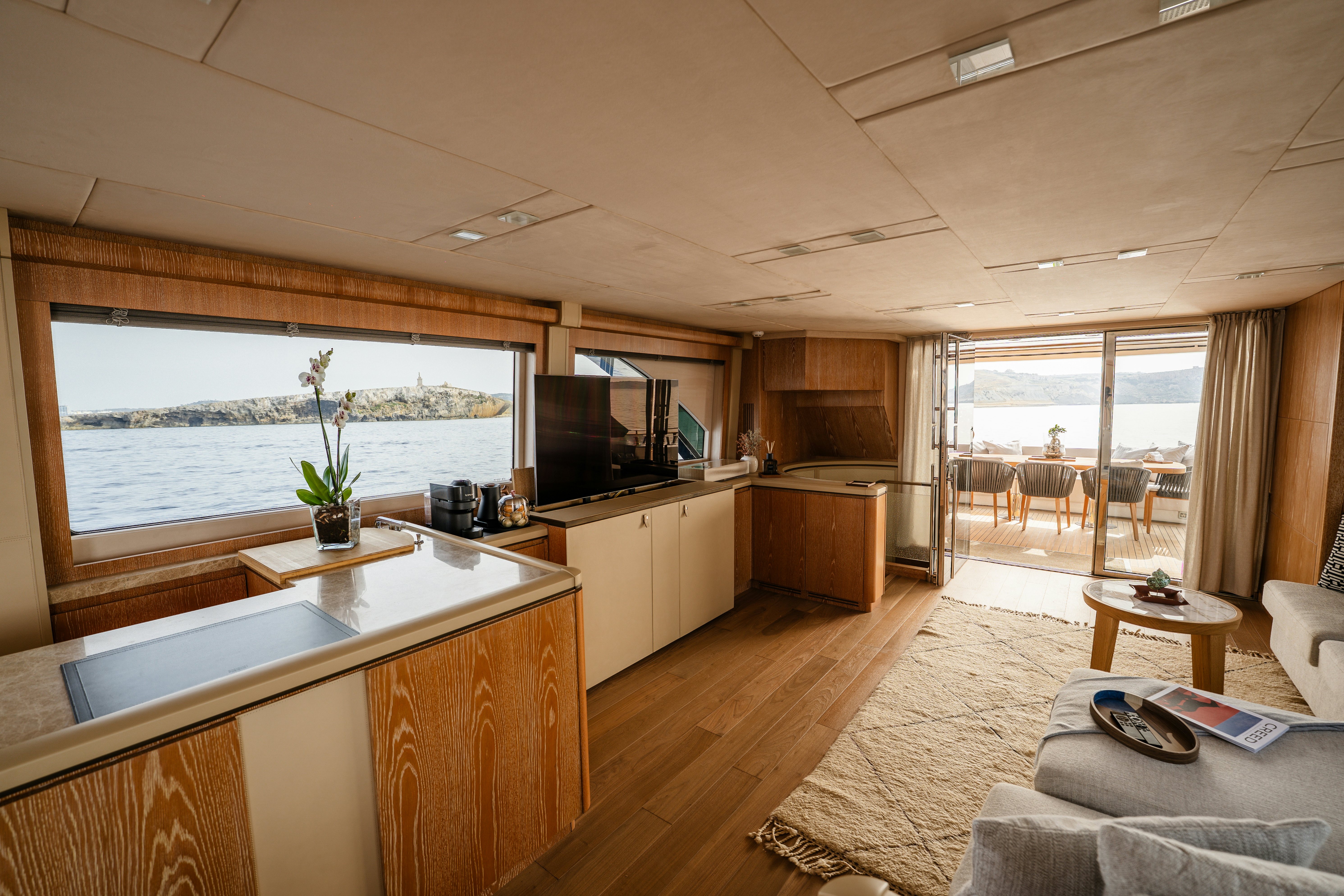 a large modern looking living room aboard VENUS Yacht for Sale