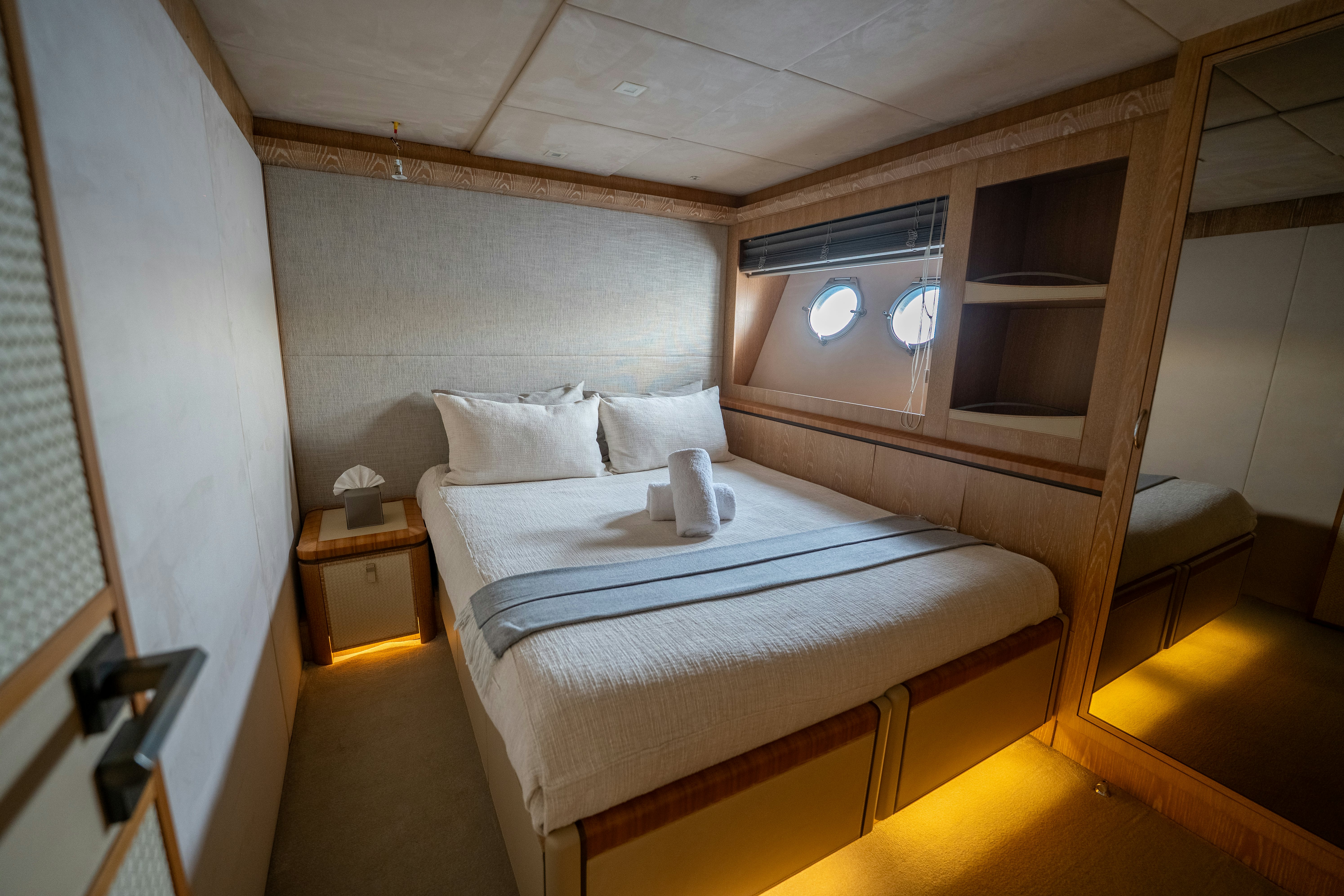 a bed in a room aboard VENUS Yacht for Sale