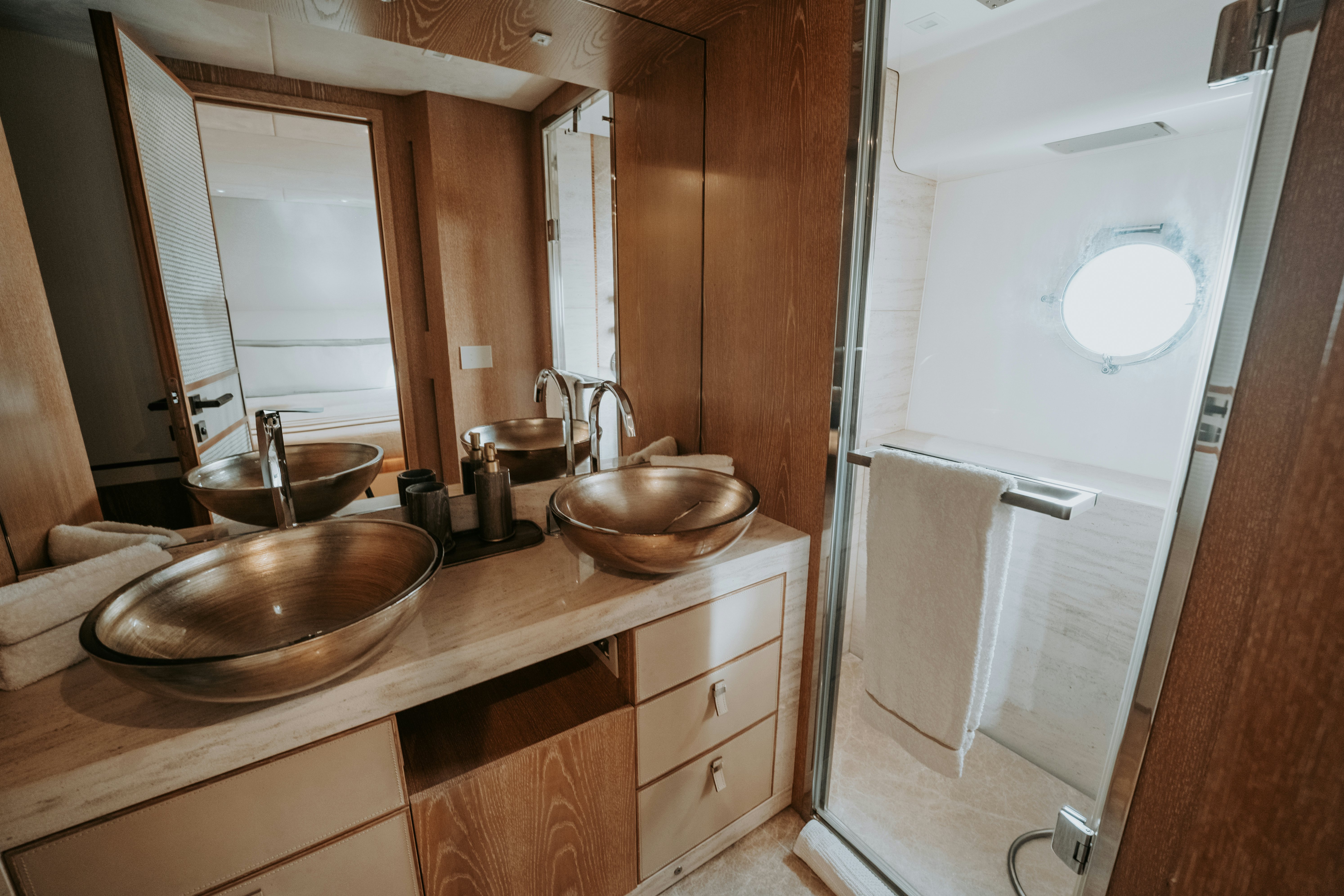 a bathroom with sinks and mirrors aboard VENUS Yacht for Sale