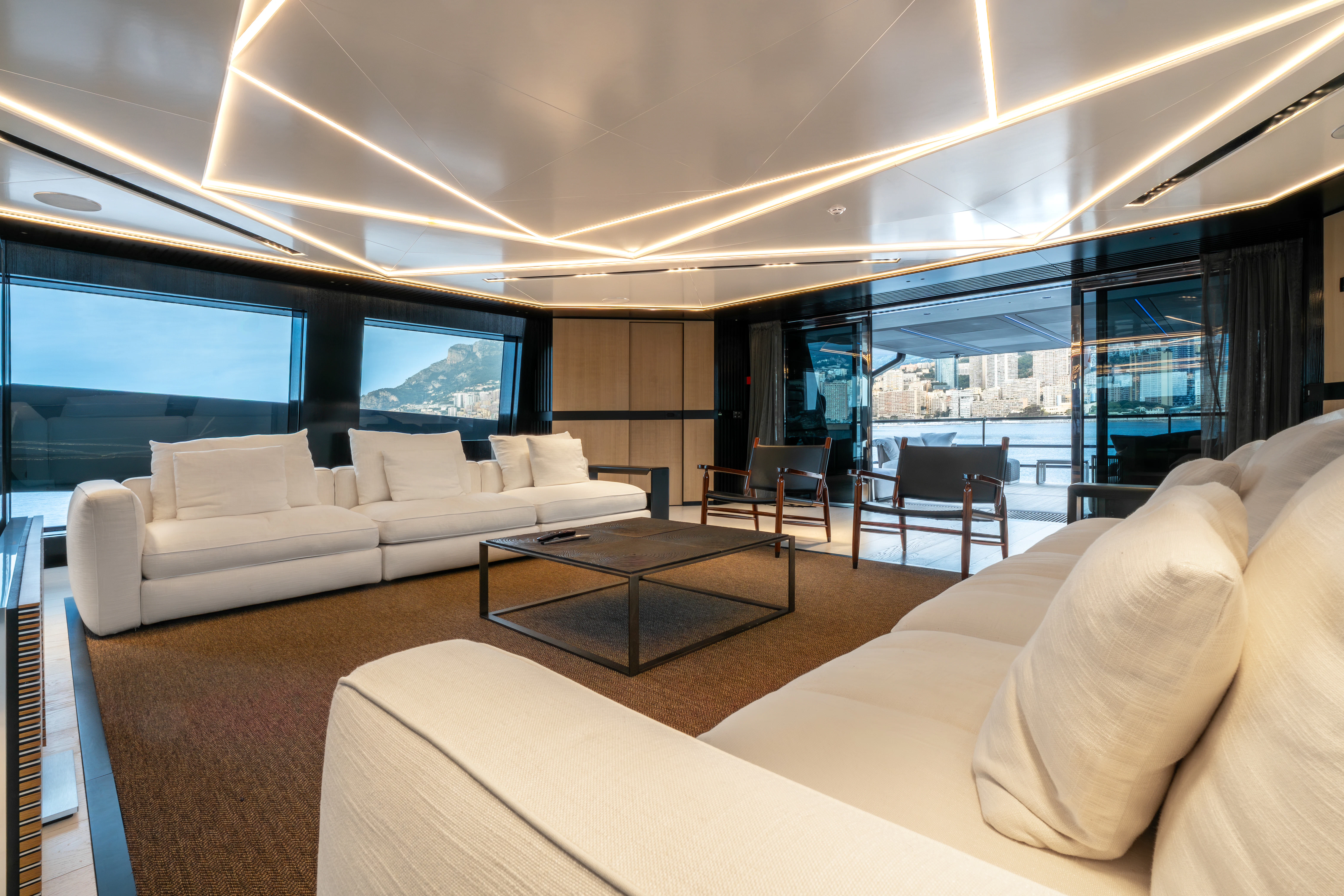 a modern looking living room aboard K+ Yacht for Sale
