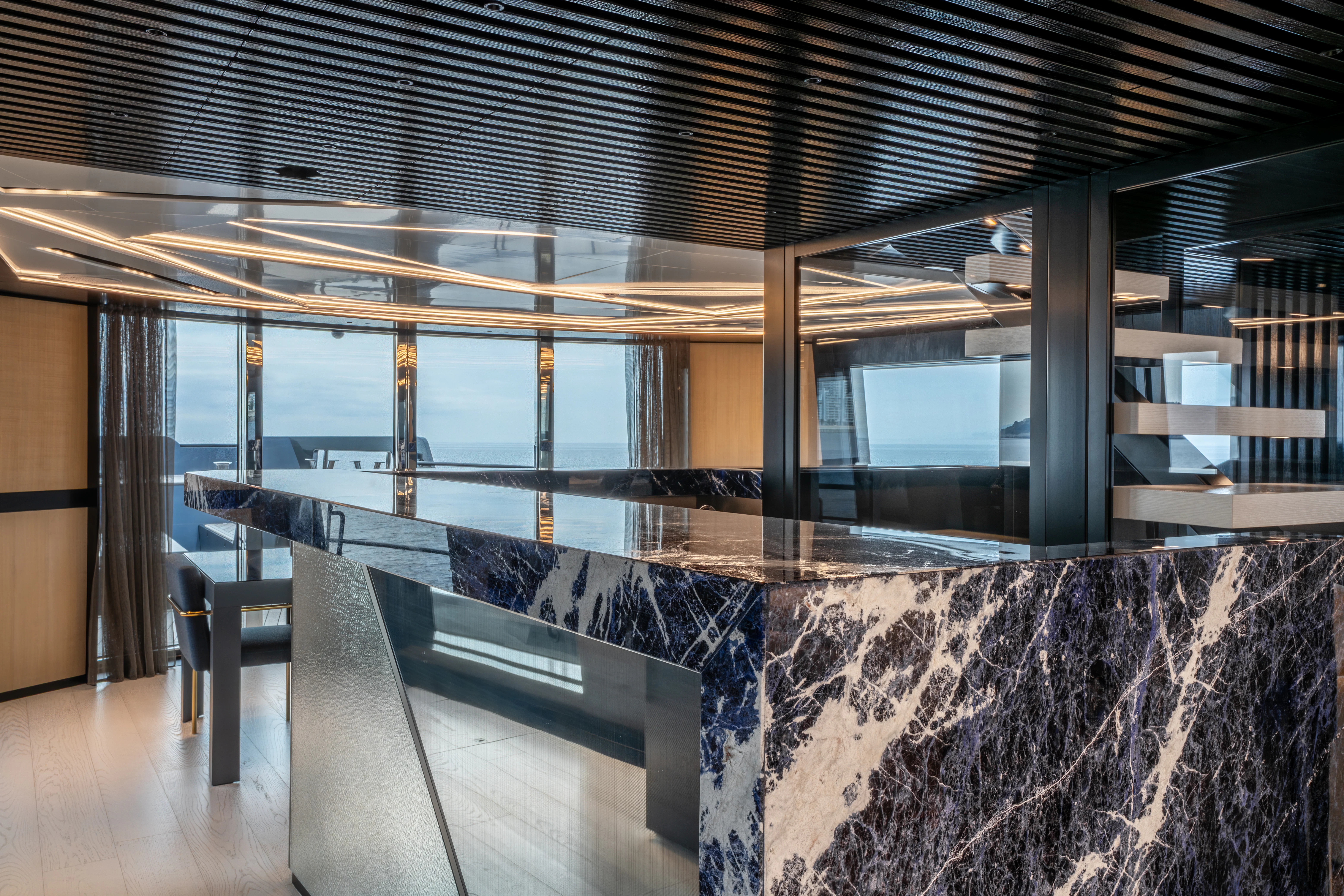 a room with a large window aboard K+ Yacht for Sale