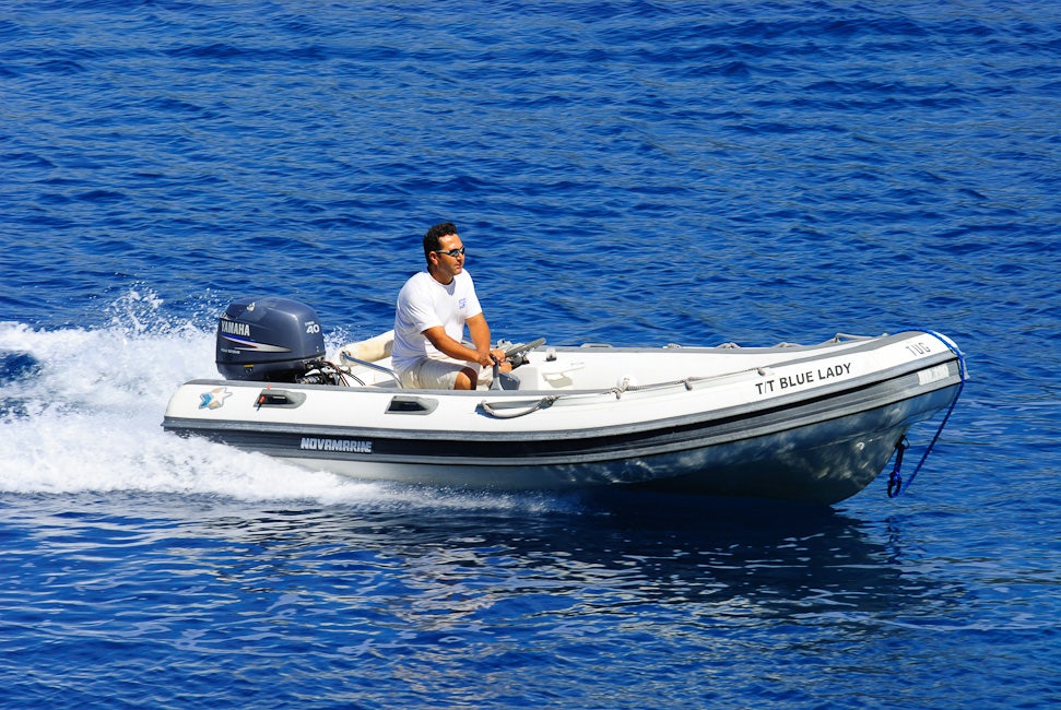 a man on a boat aboard BLUE LADY Yacht for Sale
