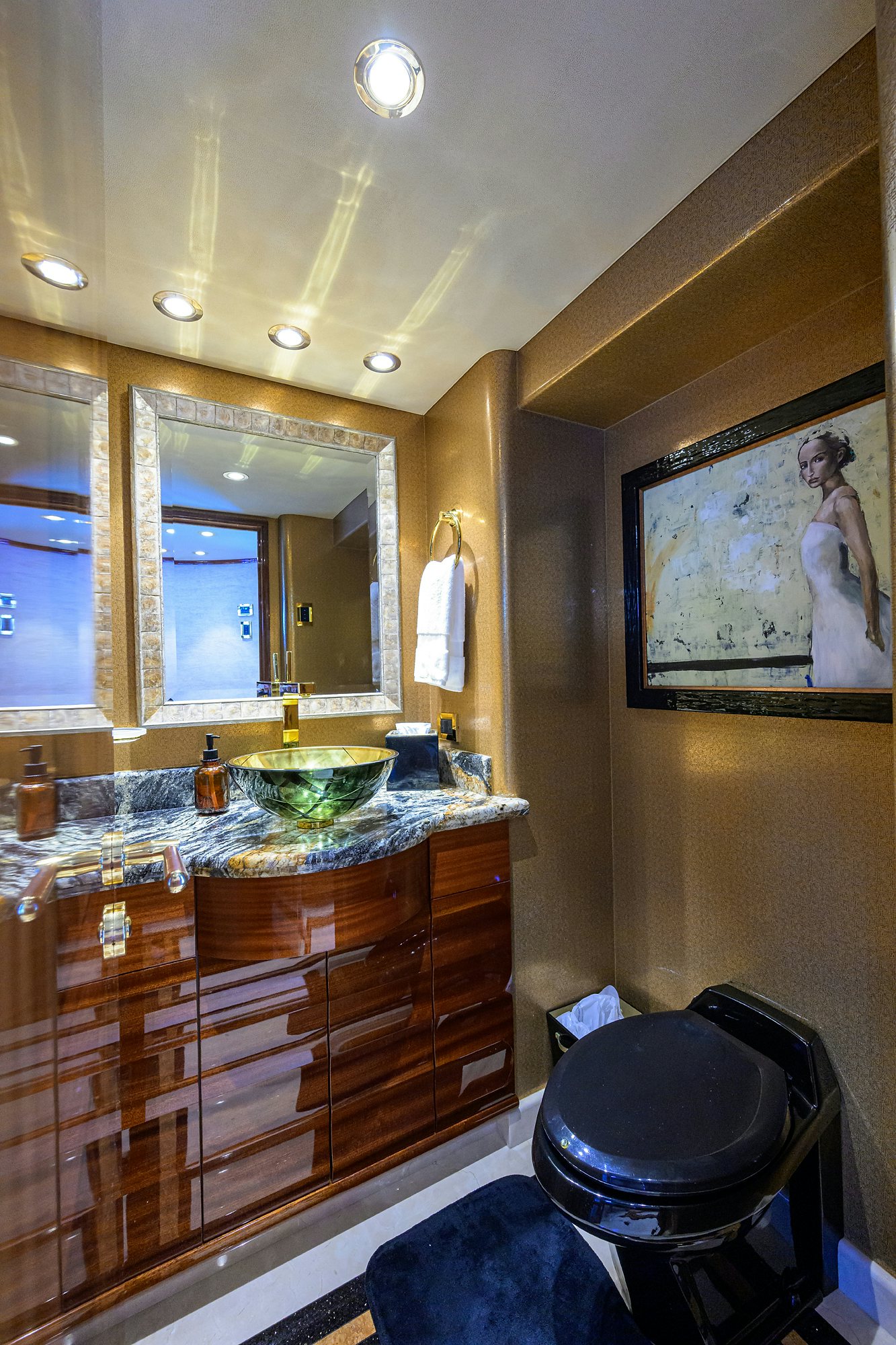 a bathroom with a large mirror aboard REMY ROO Yacht for Sale