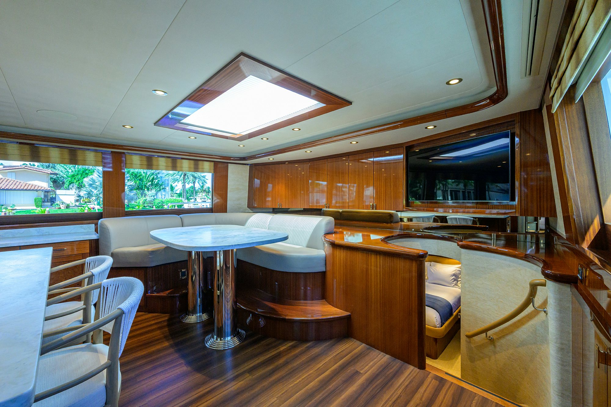 a room with a table and chairs aboard REMY ROO Yacht for Sale