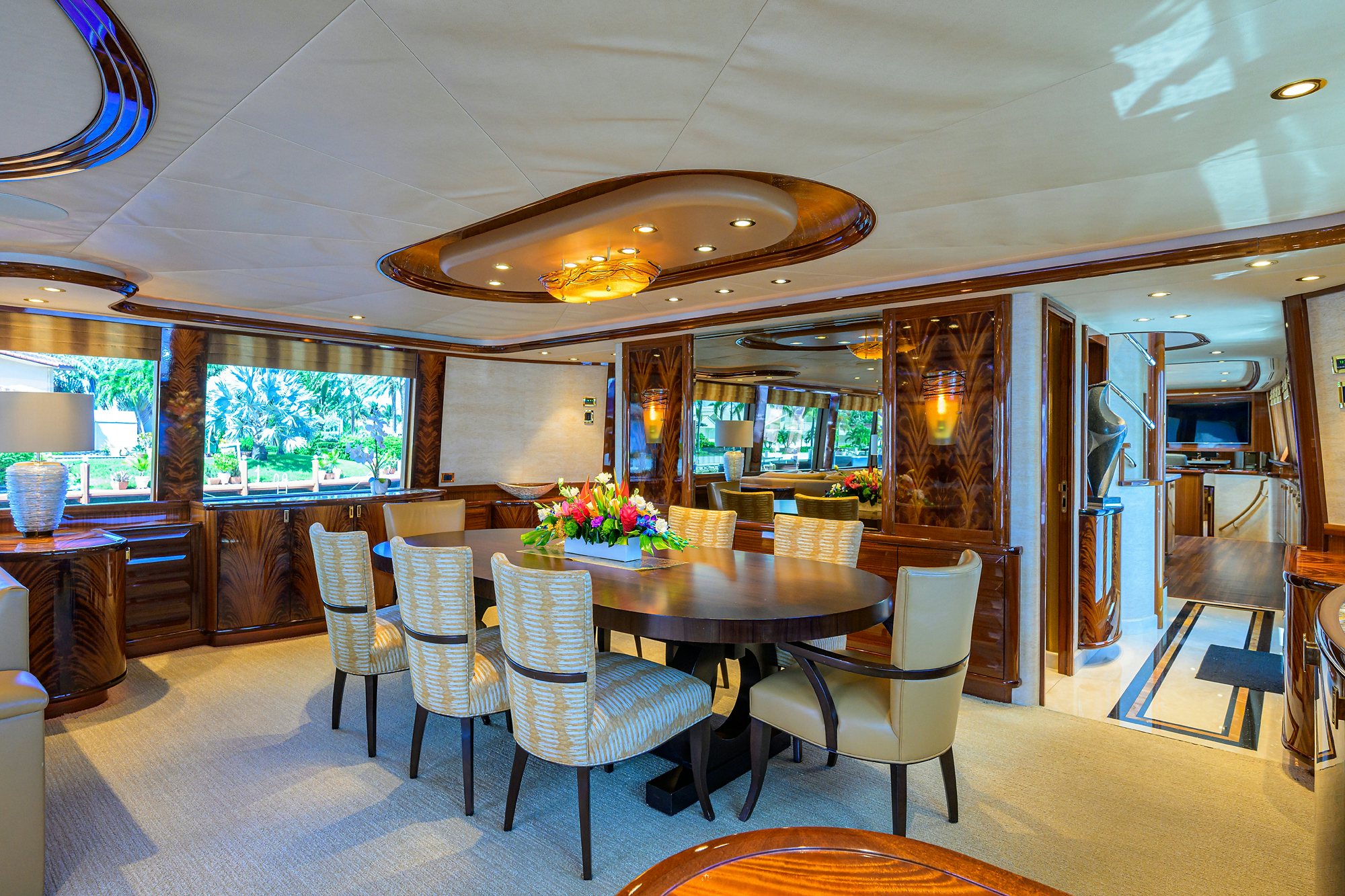 a dining room with a table and chairs aboard REMY ROO Yacht for Sale