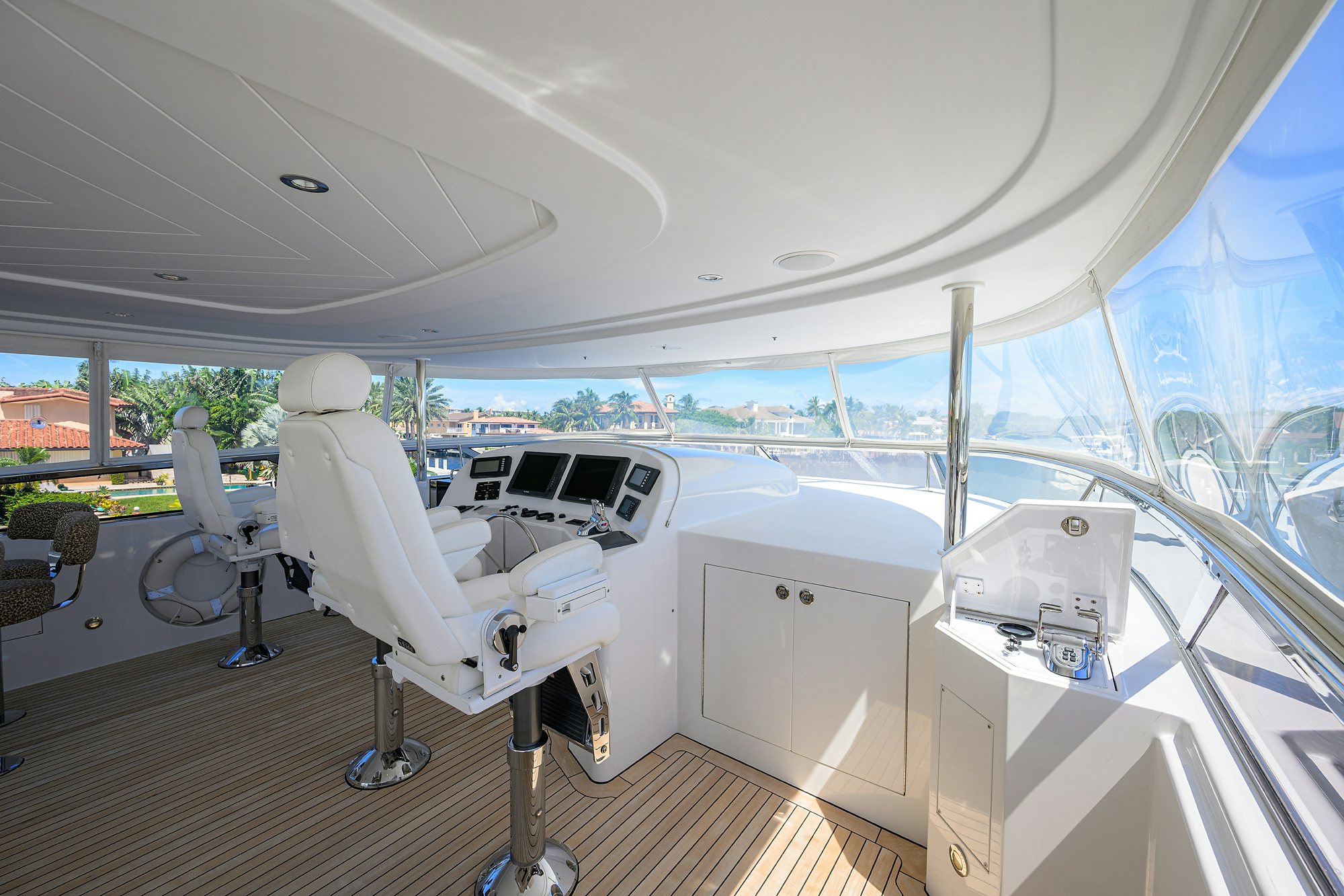 a room with a large window and a large white chair aboard REMY ROO Yacht for Sale