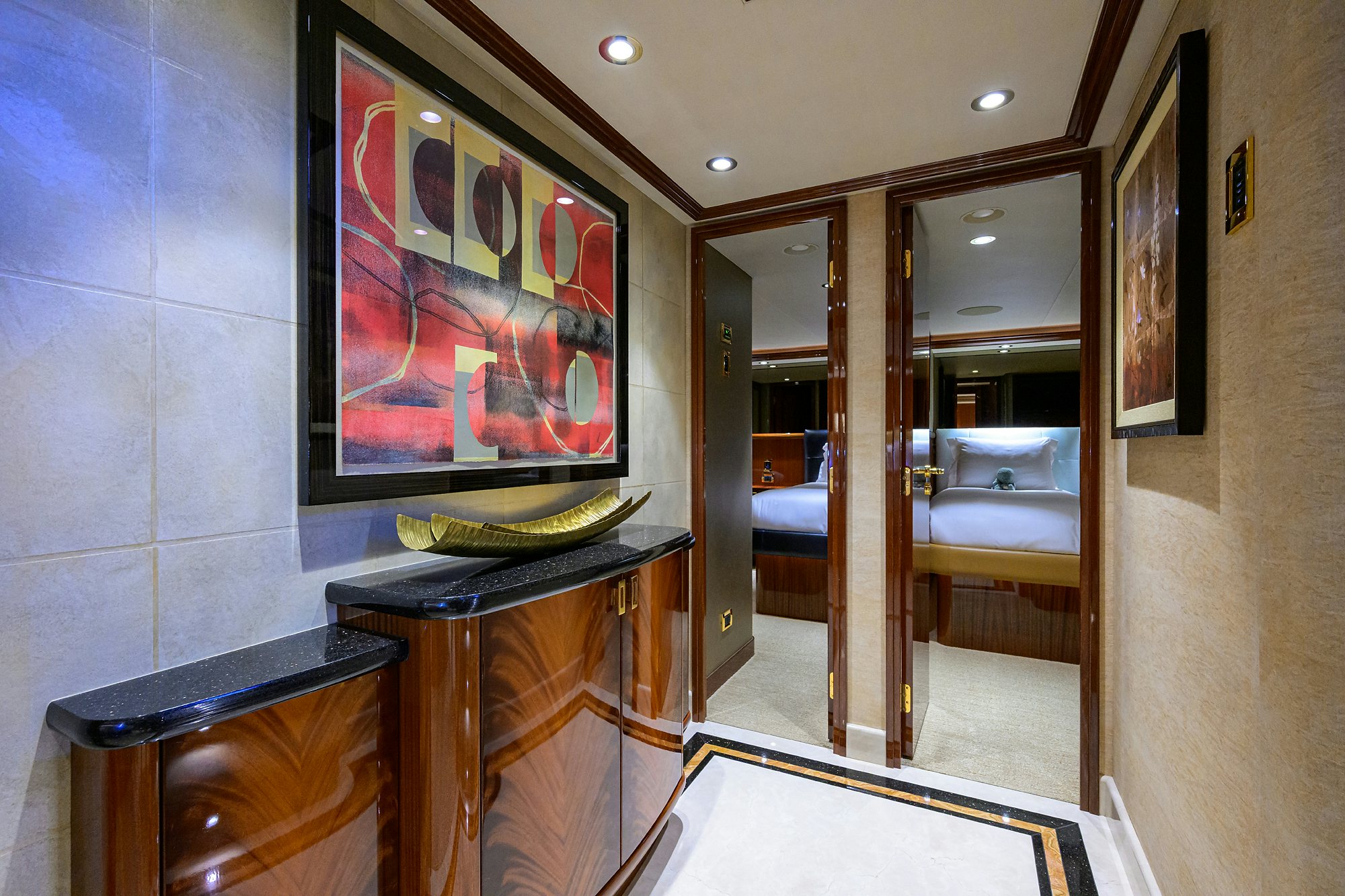 a room with a large mirror and a bed aboard REMY ROO Yacht for Sale