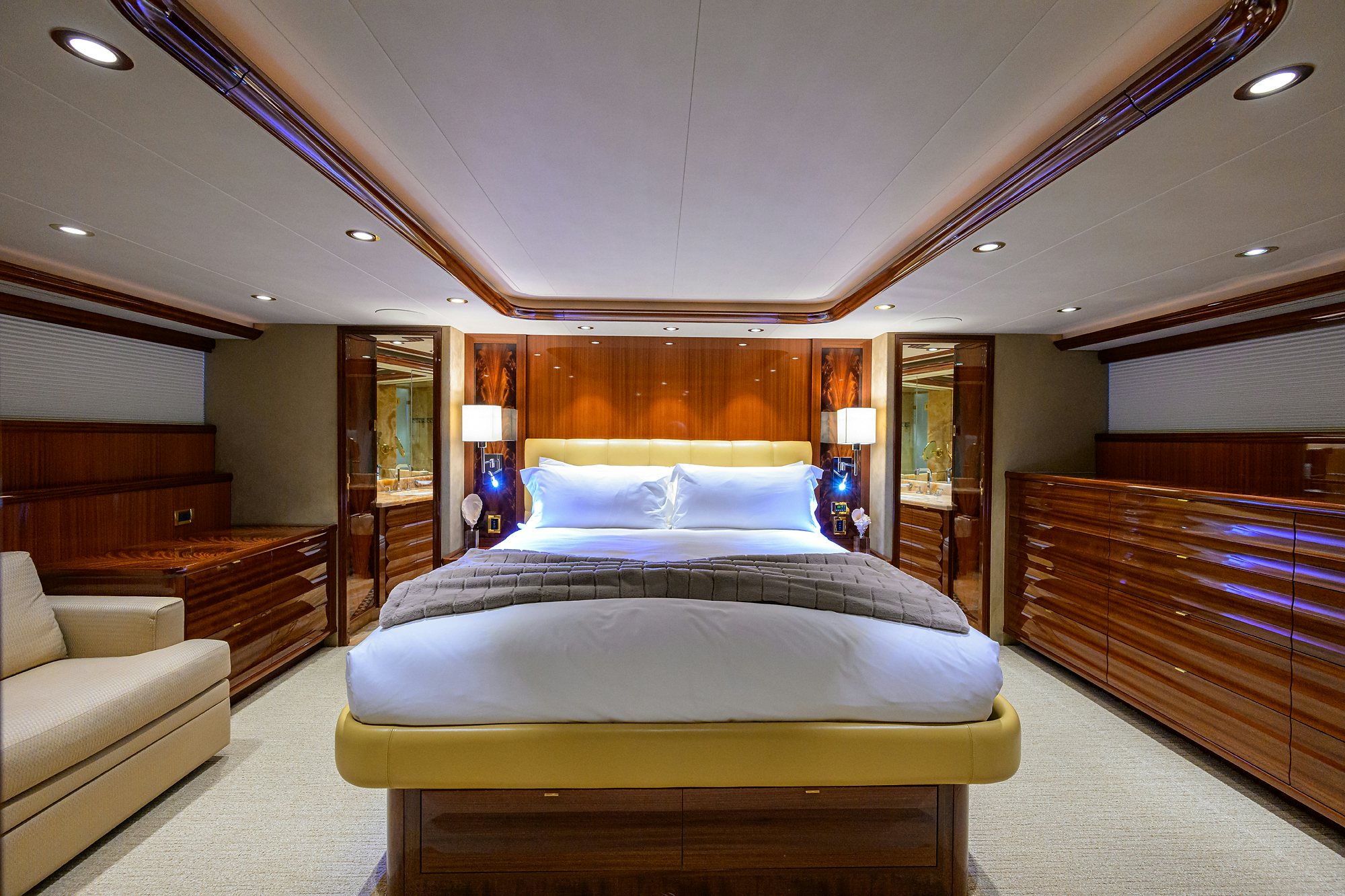 a room with a bed and a desk aboard REMY ROO Yacht for Sale