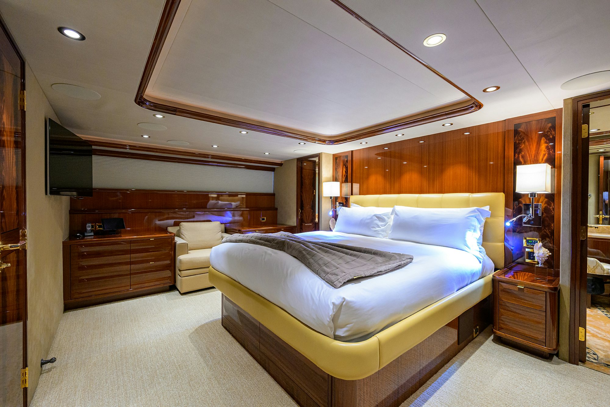 a room with a bed and a desk aboard REMY ROO Yacht for Sale