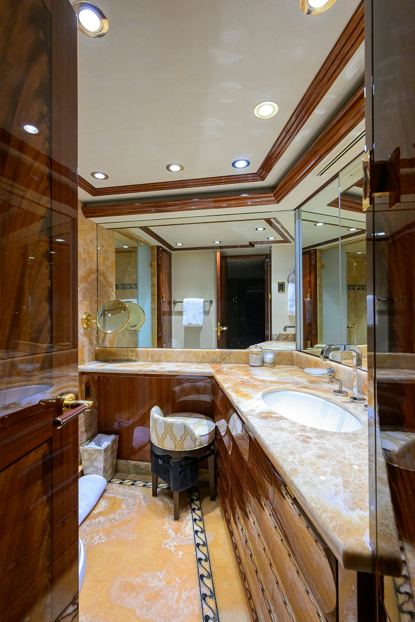 a bathroom with a sink and a mirror aboard REMY ROO Yacht for Sale