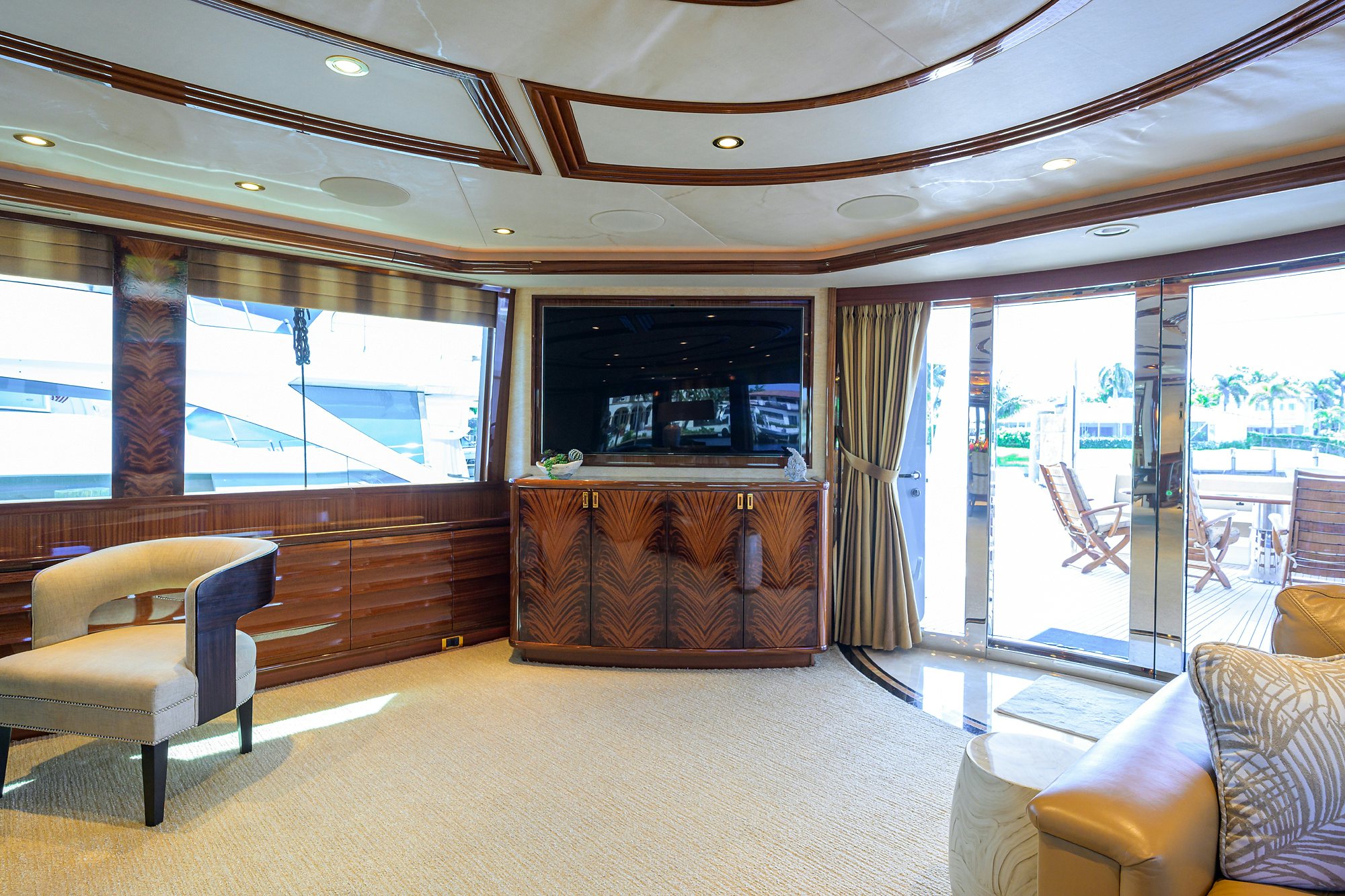a room with a bed and a chair aboard REMY ROO Yacht for Sale
