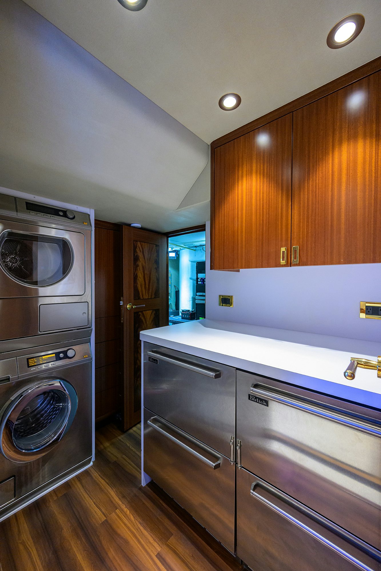 a kitchen with stainless steel appliances aboard REMY ROO Yacht for Sale