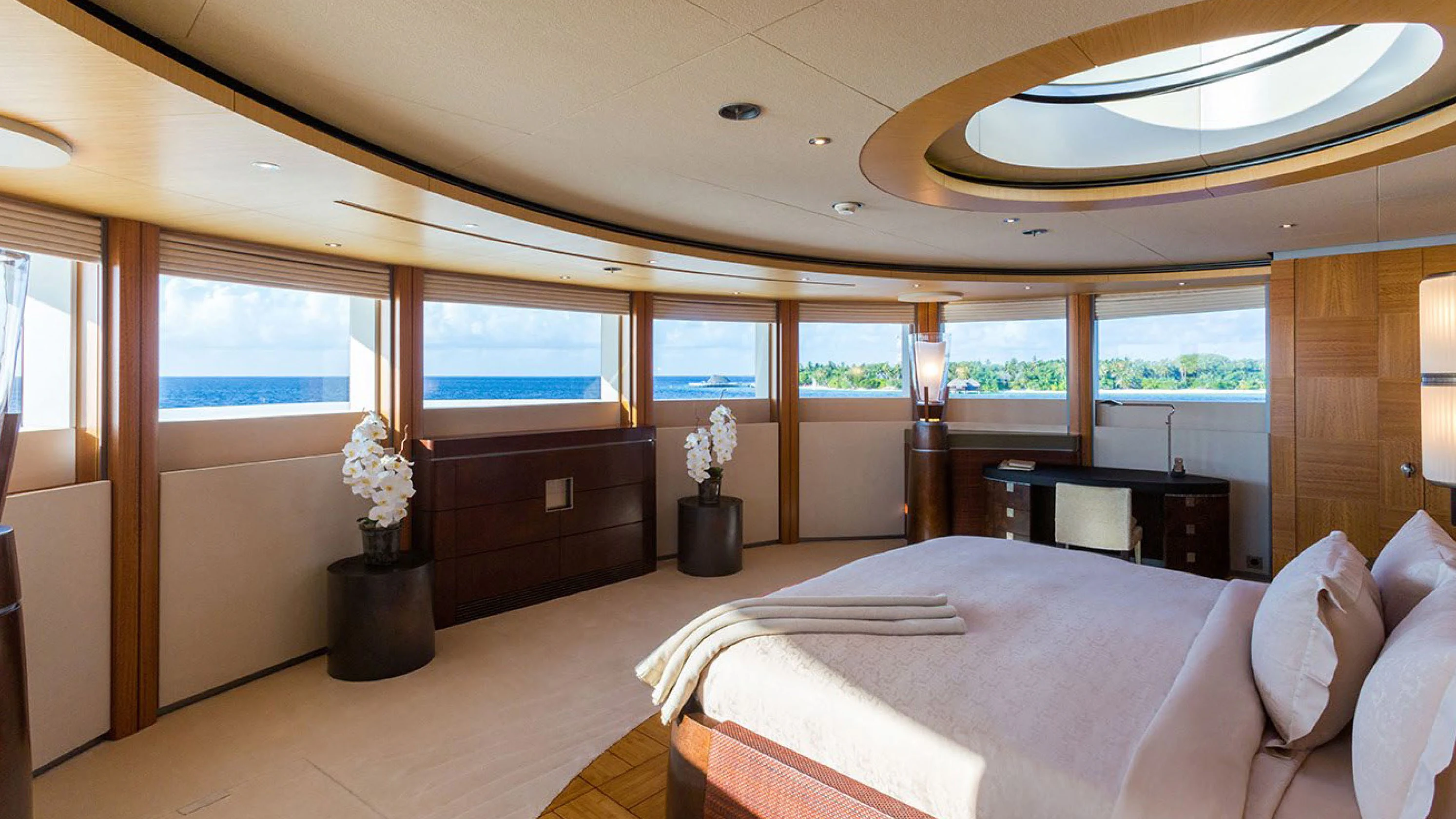 a large bedroom with a large bed aboard WHEELS Yacht for Charter