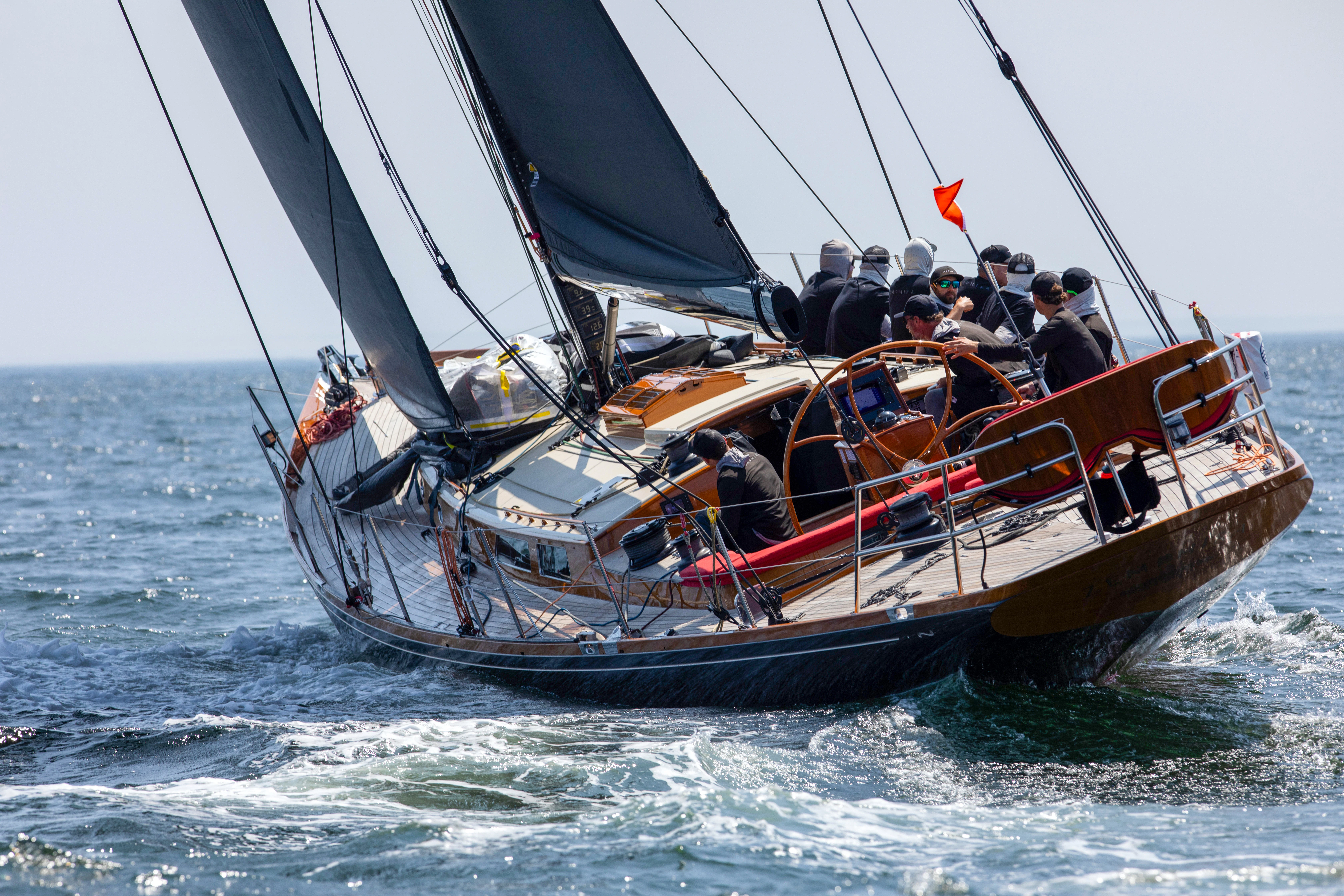 a group of people sailing on a boat aboard FALCON Yacht for Sale
