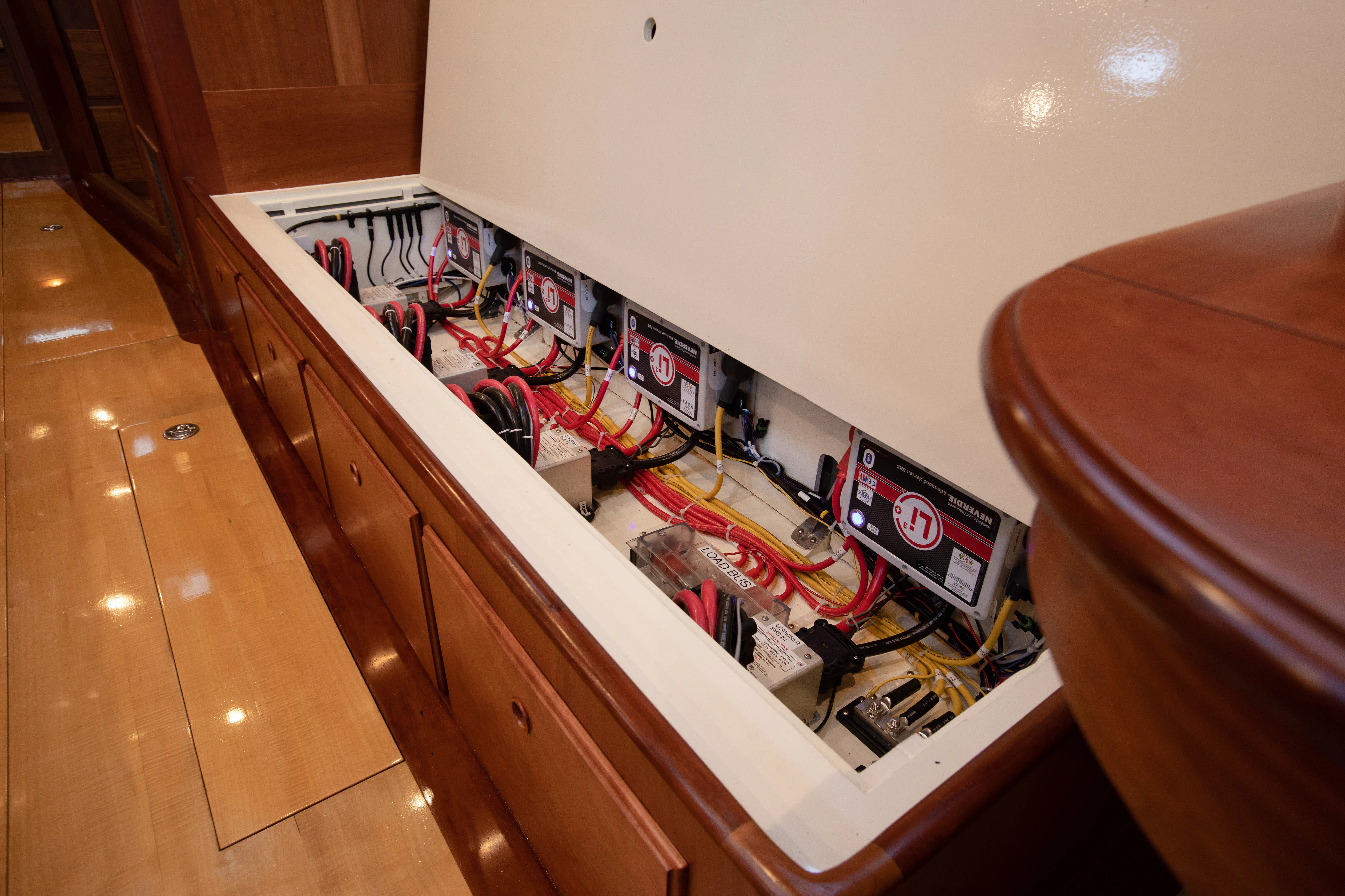 a shelf with electronics aboard FALCON Yacht for Sale
