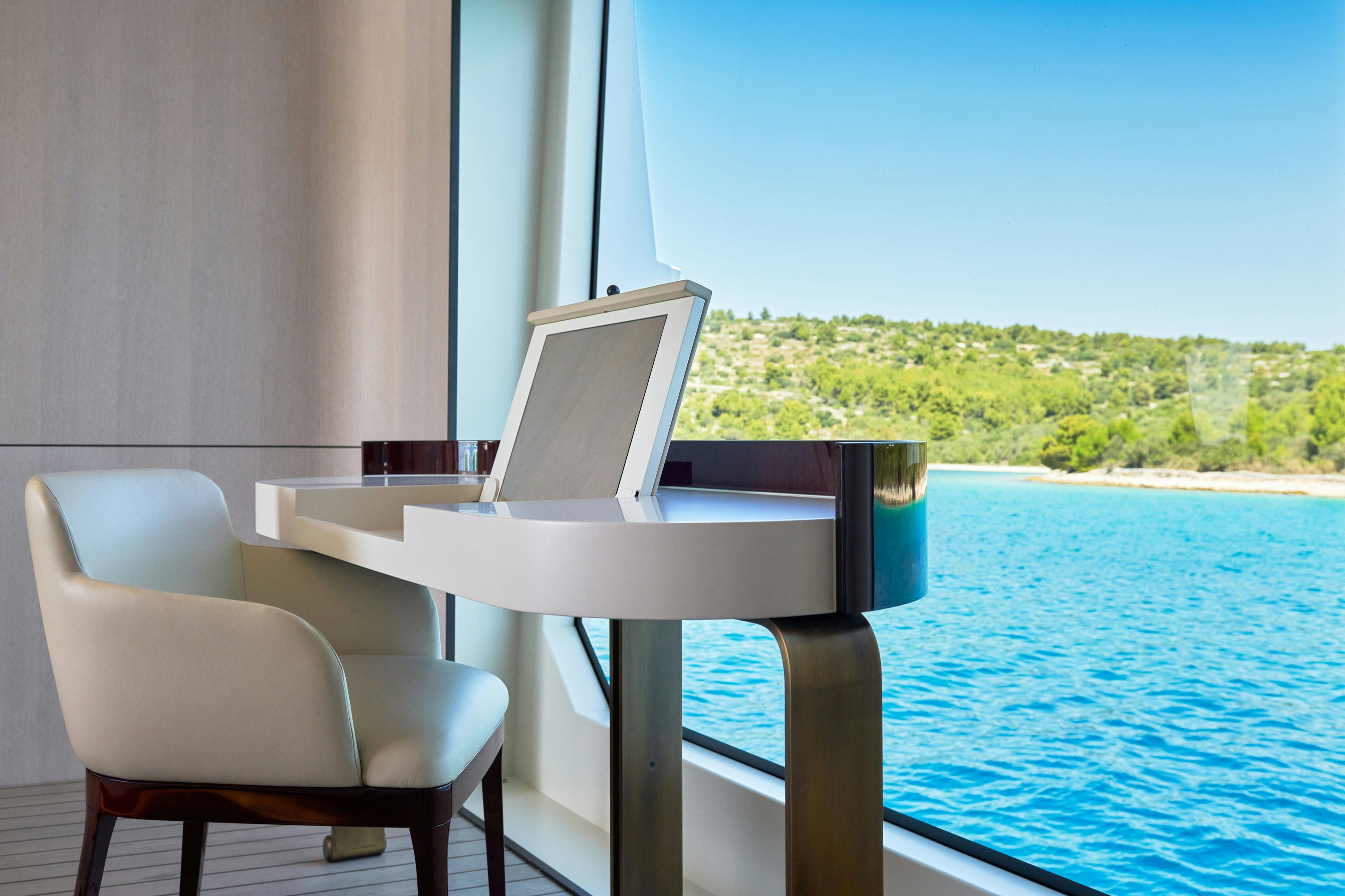 a chair next to a pool aboard HEED Yacht for Sale