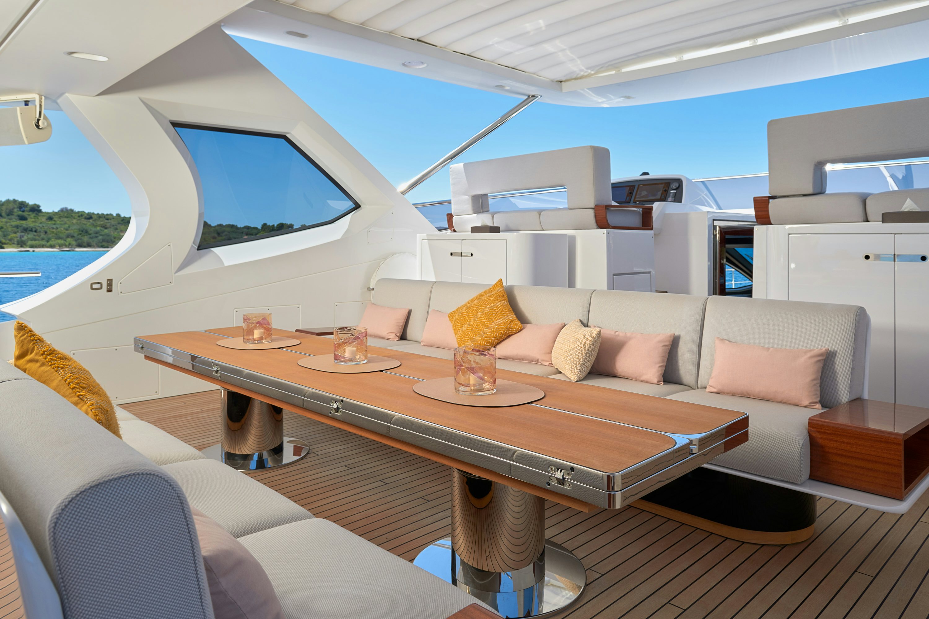 a living room with a couch and a table aboard HEED Yacht for Sale
