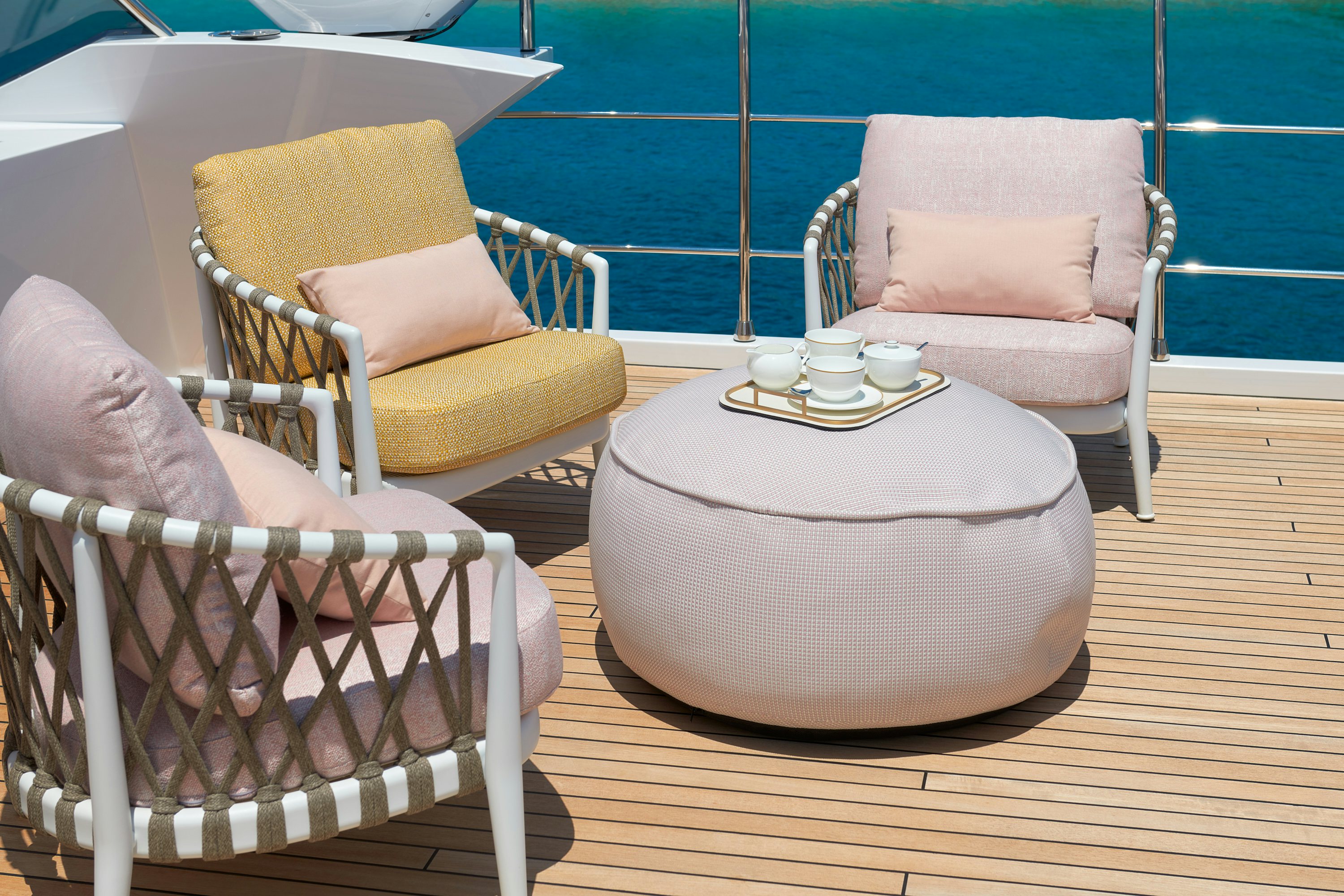 a couple of chairs by a pool aboard HEED Yacht for Sale
