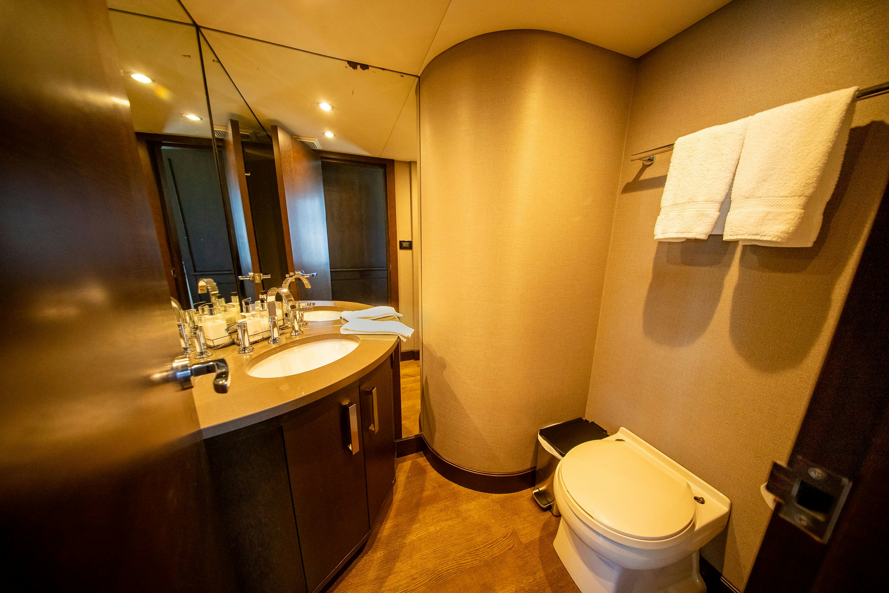 a bathroom with a toilet and sink aboard ENCORE Yacht for Sale