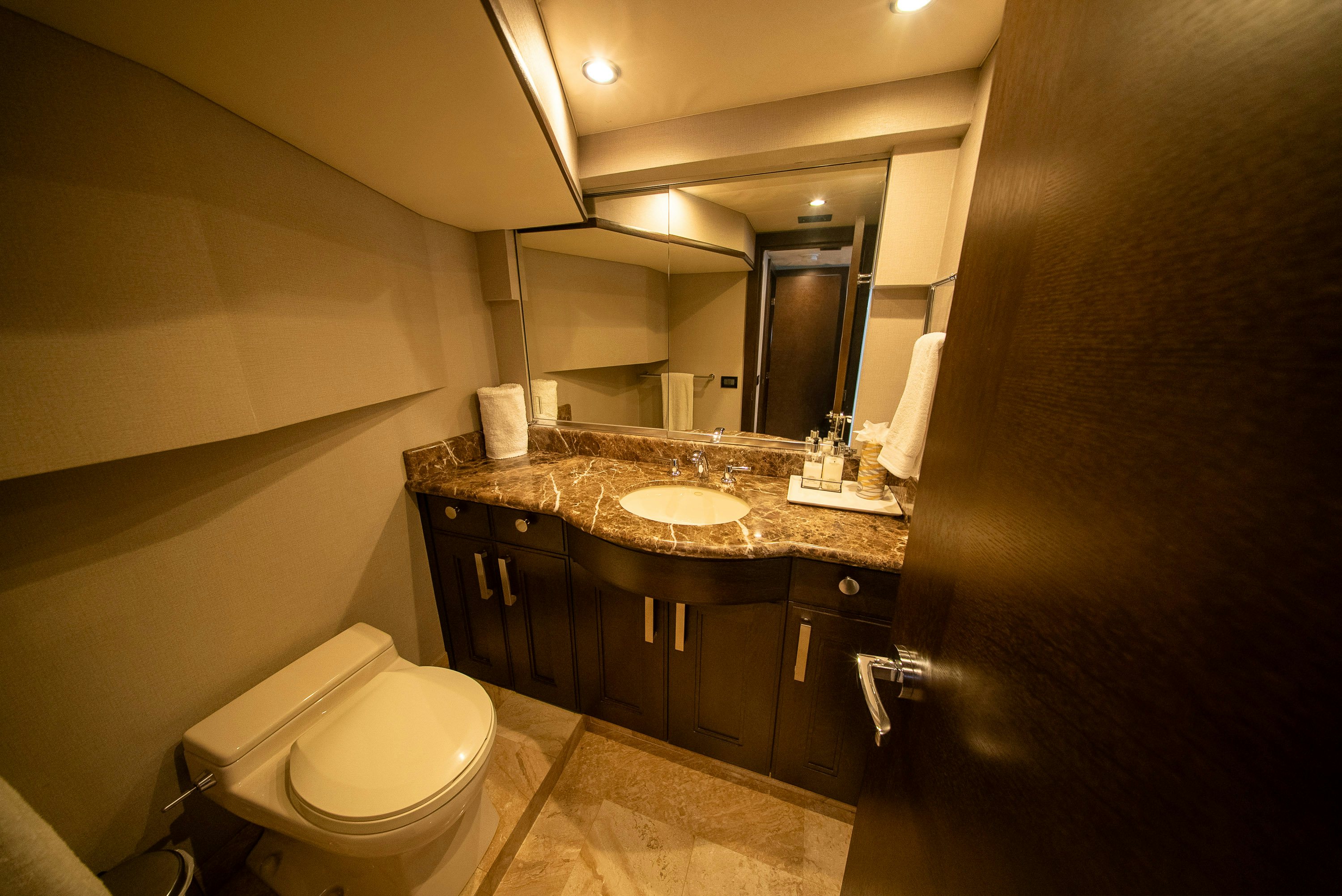 a bathroom with a sink and a toilet aboard ENCORE Yacht for Sale