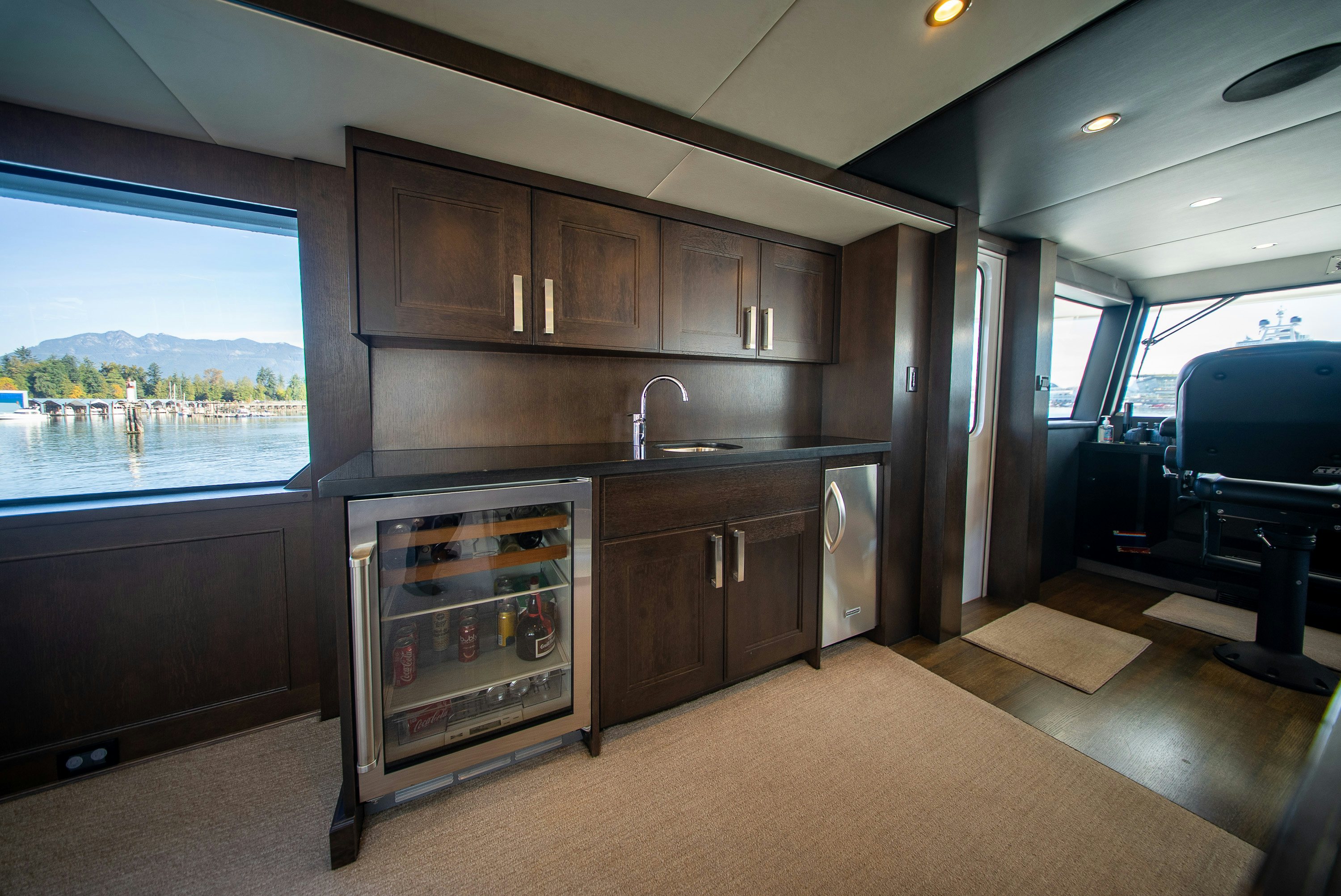 a kitchen with a stove and oven aboard ENCORE Yacht for Sale