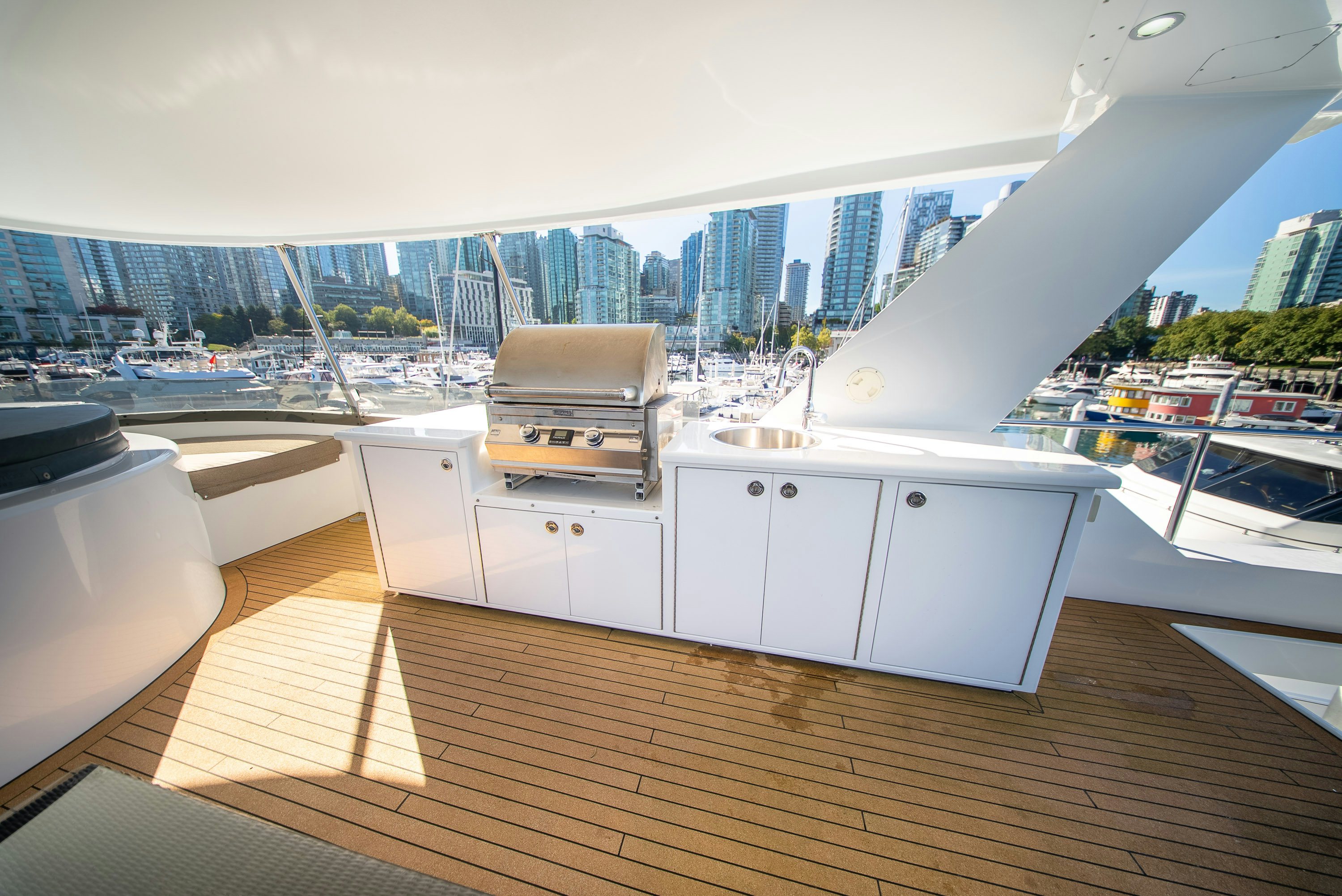 a room with a view of a city and a large building aboard ENCORE Yacht for Sale
