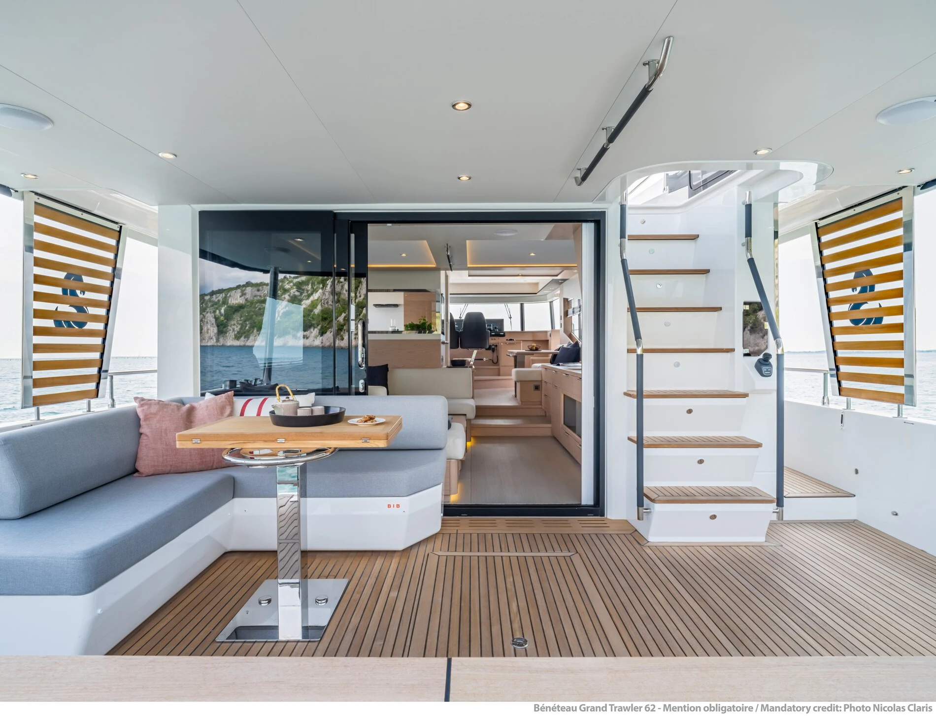 a living room with a wood floor aboard ABIDE AWHILE Yacht for Sale