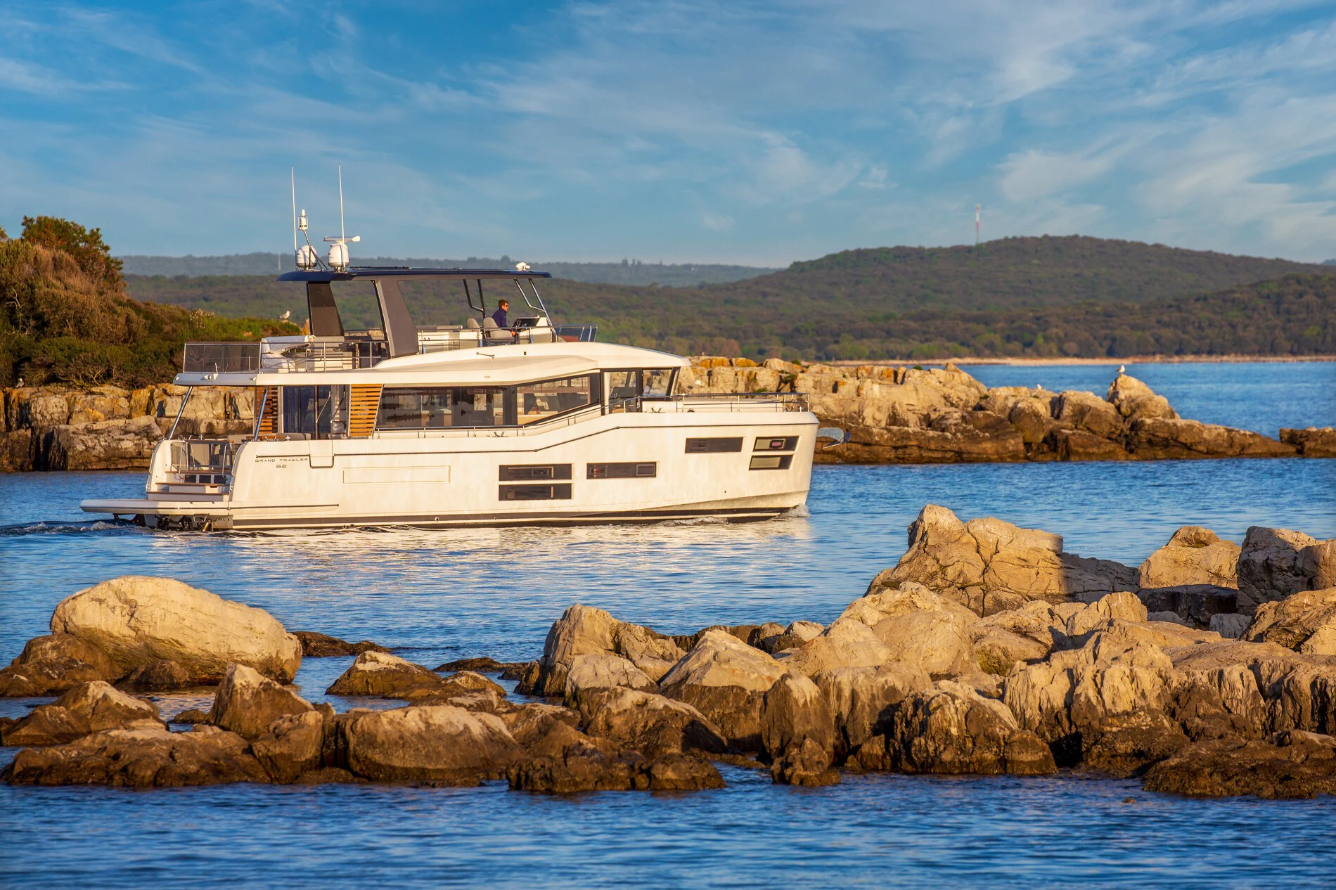 a boat on the water aboard ABIDE AWHILE Yacht for Sale