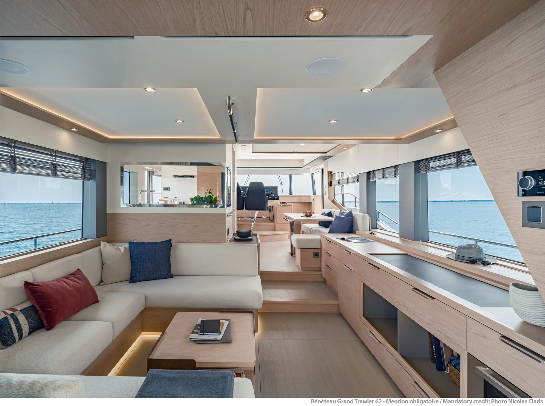 a living room with a couch and a table aboard ABIDE AWHILE Yacht for Sale