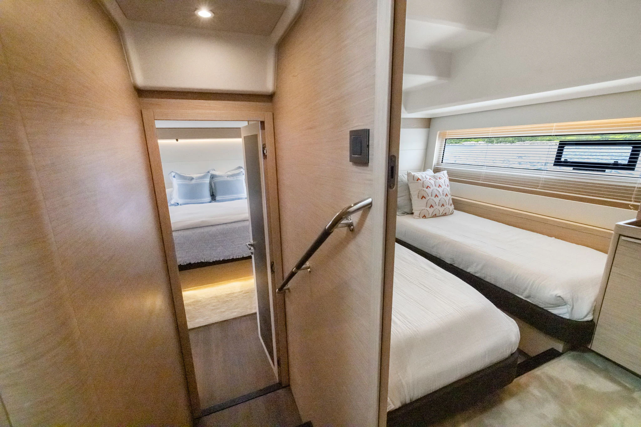 a room with a bed and a mirror aboard ABIDE AWHILE Yacht for Sale