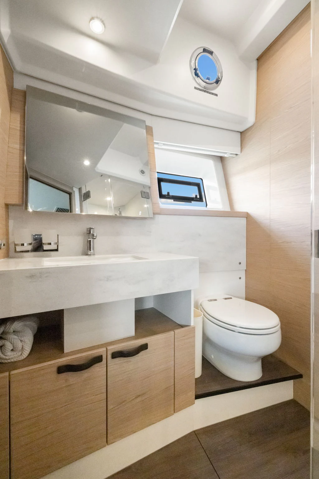 a bathroom with a toilet and sink aboard ABIDE AWHILE Yacht for Sale