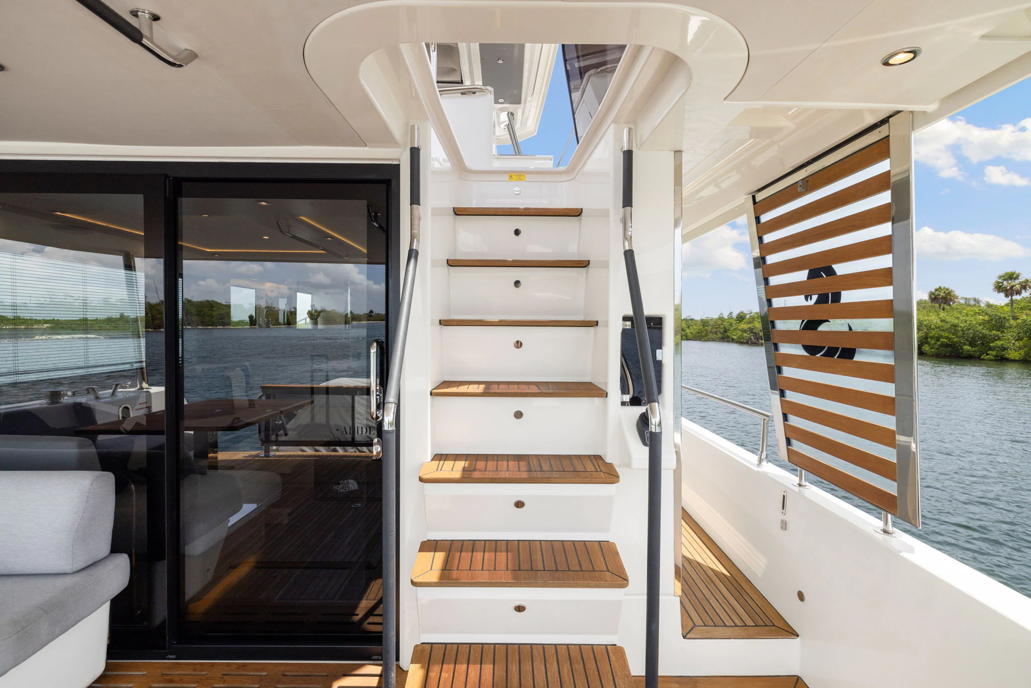 a boat with open doors aboard ABIDE AWHILE Yacht for Sale