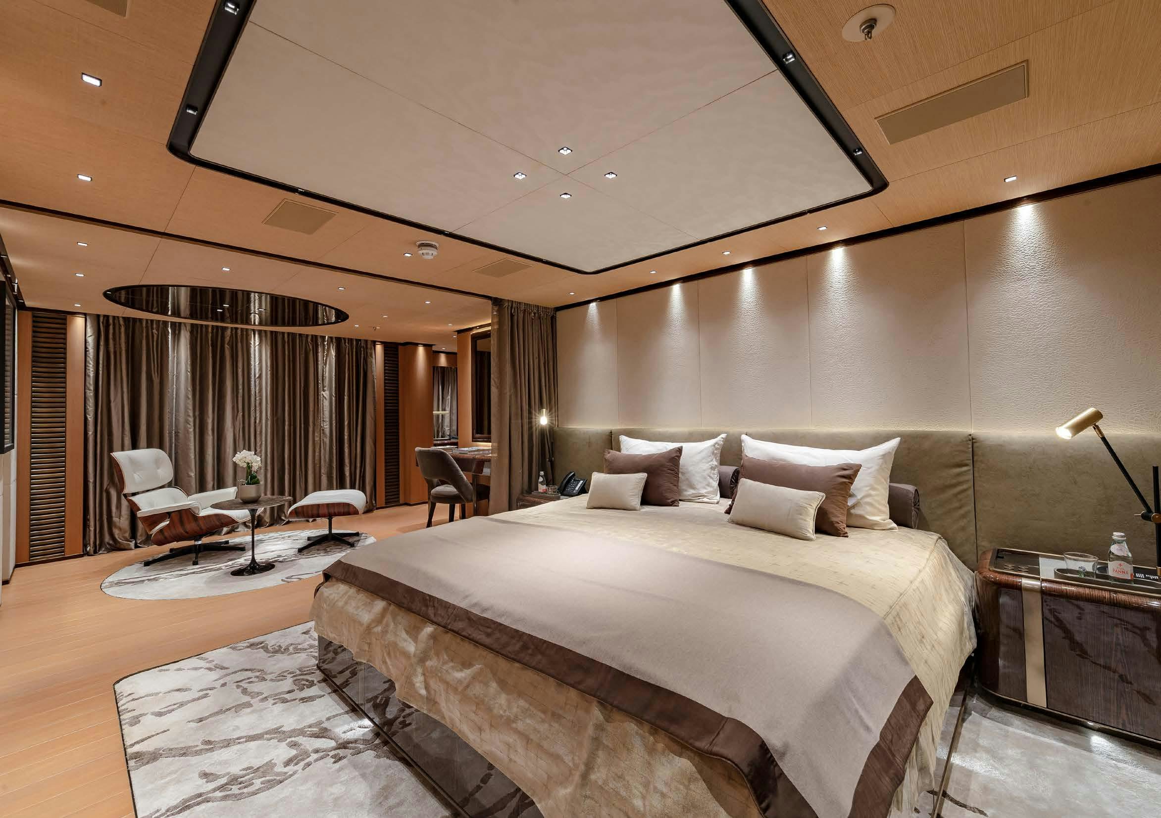 a large bed in a hotel room aboard VERTIGE Yacht for Sale