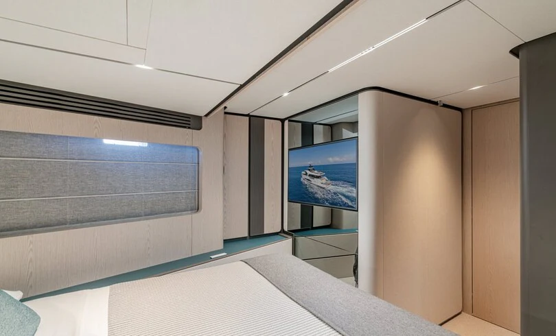 a room with a large screen aboard TRILOGY Yacht for Charter