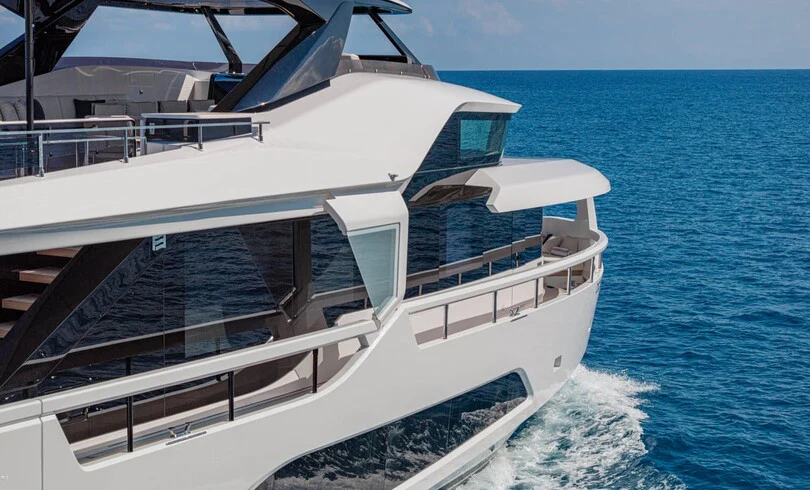 a white boat on the water aboard TRILOGY Yacht for Charter