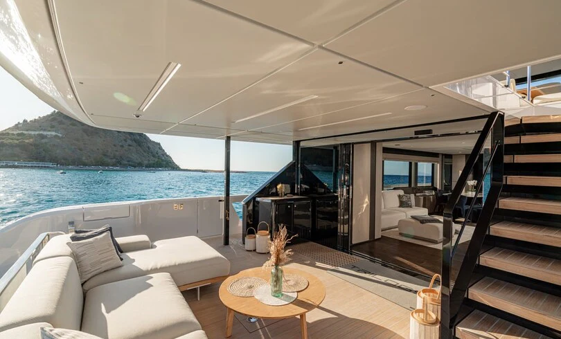 a modern house with a large balcony aboard TRILOGY Yacht for Charter