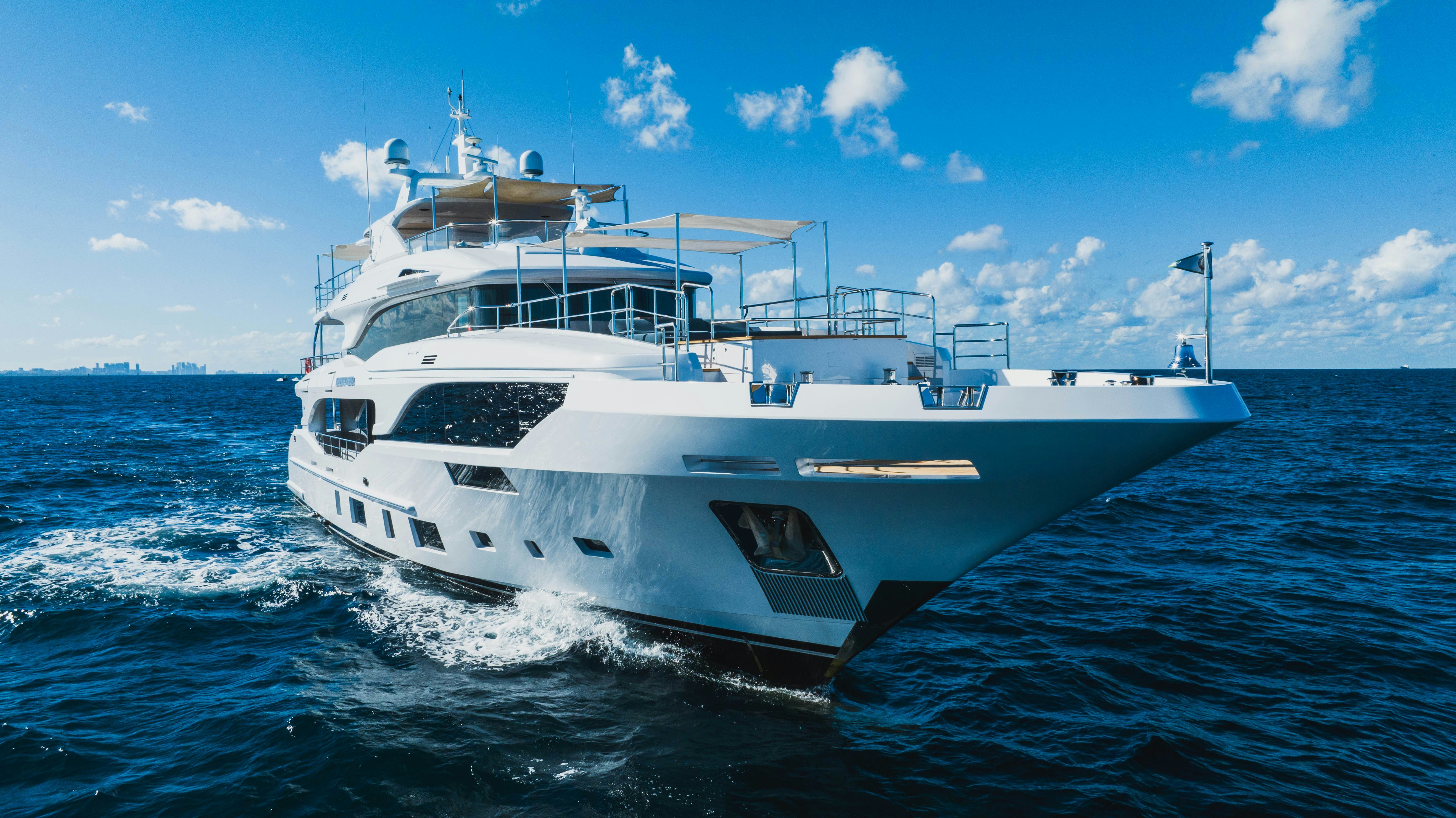 a white boat on the water aboard BELLA VITA Yacht for Sale