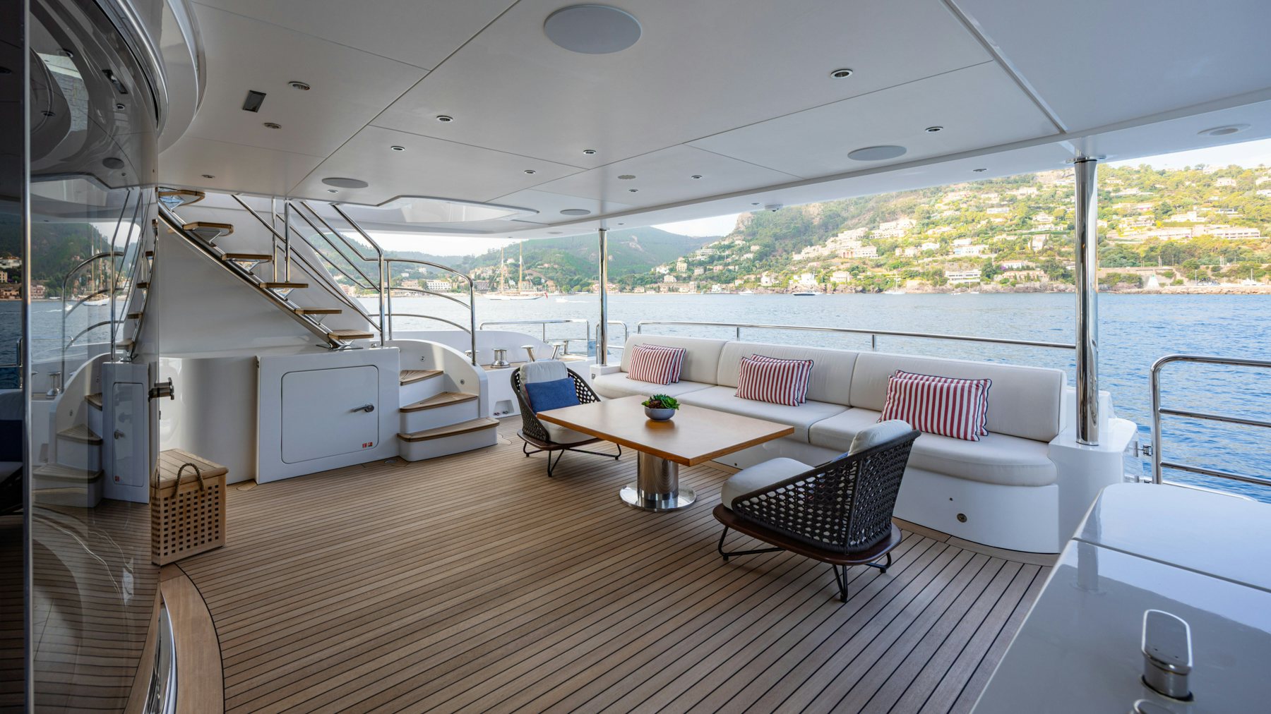 a boat with a table and chairs aboard BELLA VITA Yacht for Sale