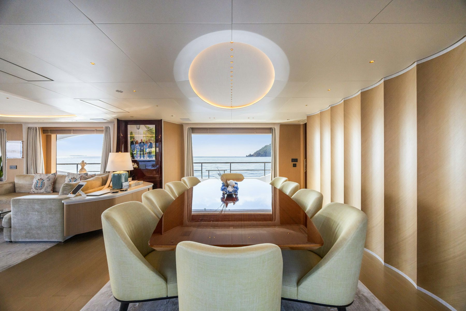 a living room with a large window aboard BELLA VITA Yacht for Sale