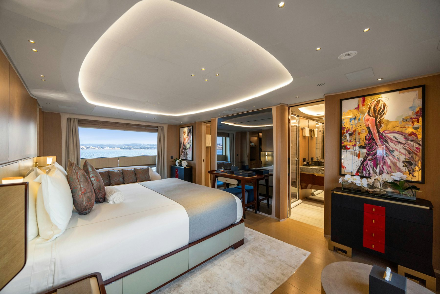 a bedroom with a large bed aboard BELLA VITA Yacht for Sale