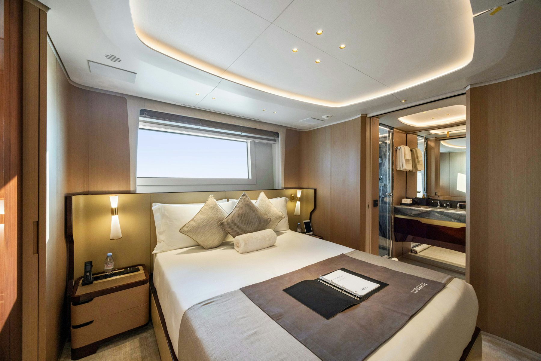 a hotel room with a bed aboard BELLA VITA Yacht for Sale