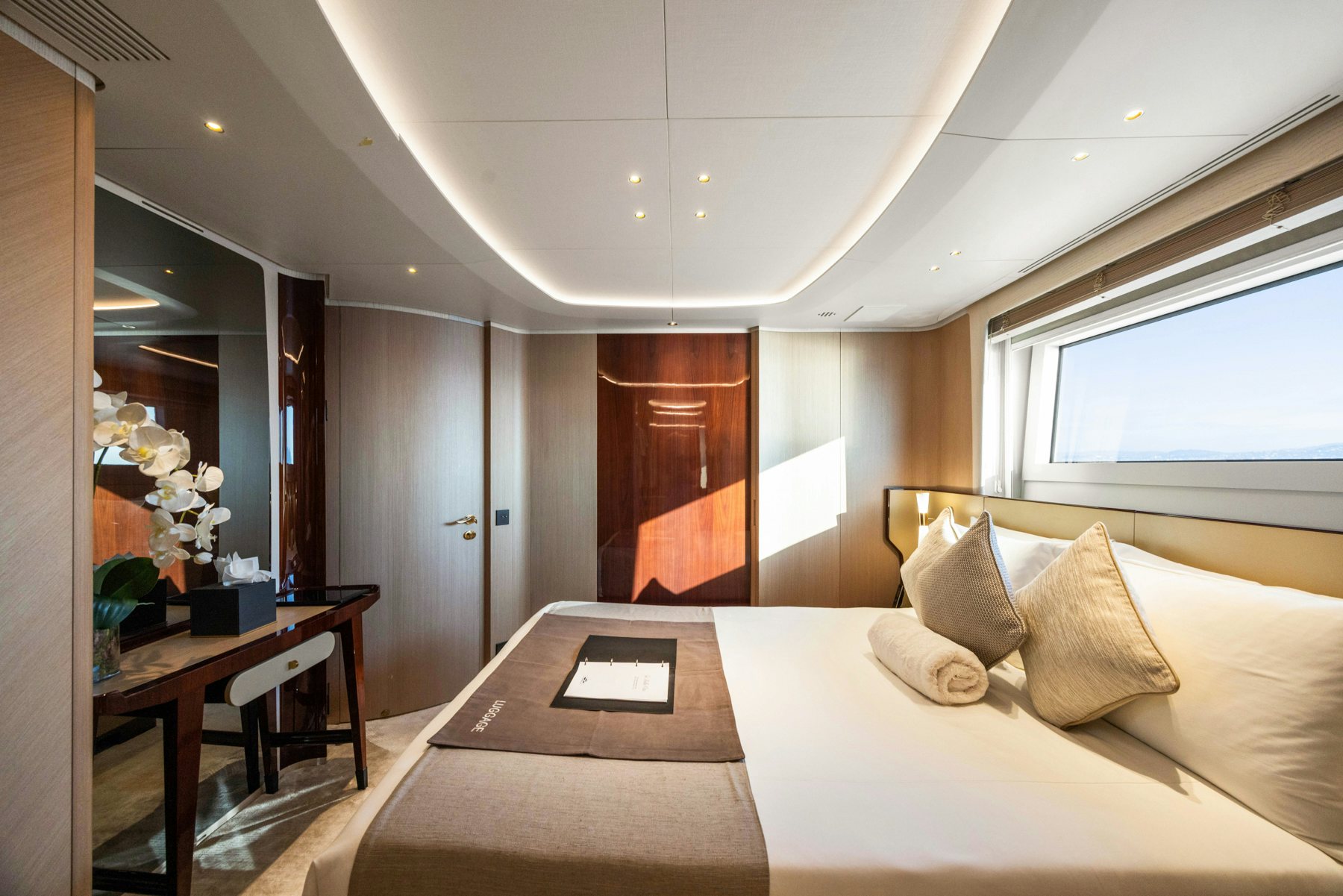a hotel room with a bed aboard BELLA VITA Yacht for Sale