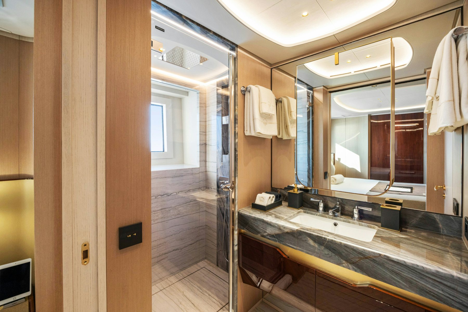 a bathroom with a large mirror aboard BELLA VITA Yacht for Sale