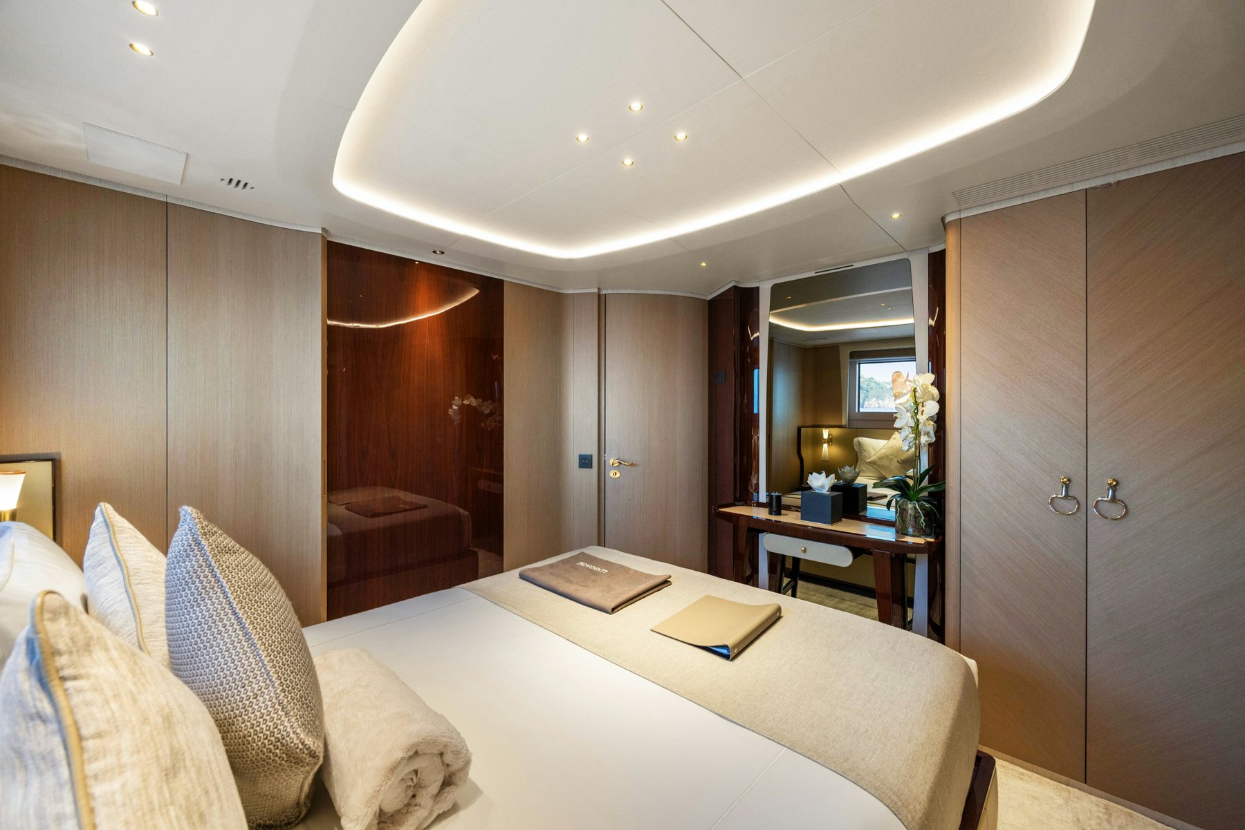 a room with a table and chairs aboard BELLA VITA Yacht for Sale